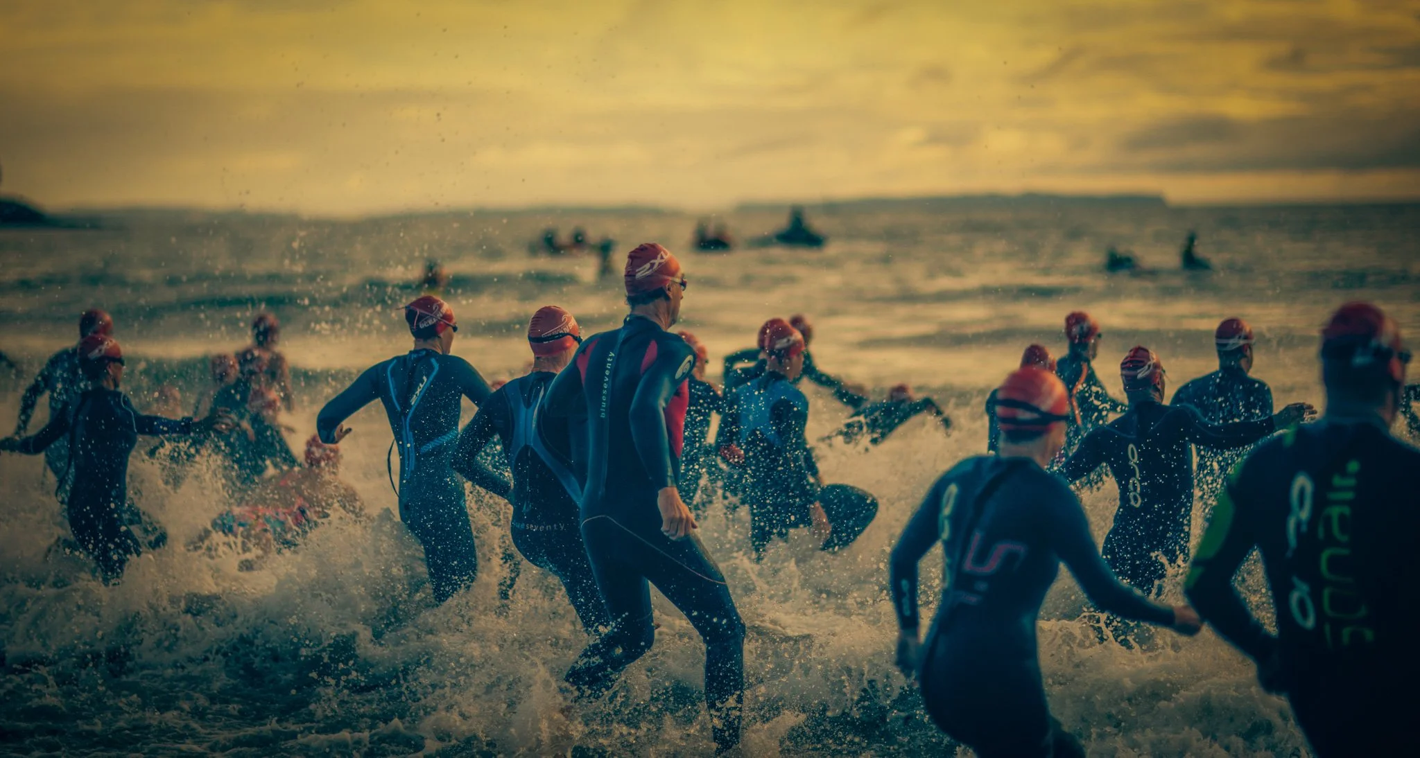 riathlon swimming start at Milford beach Auckland foam photograph Simon Shattky
