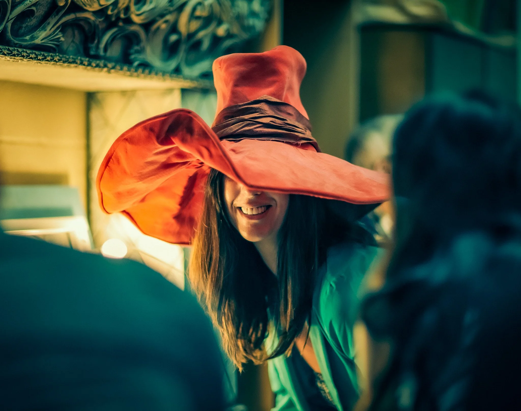 Editorial portrait woman dramatic red hat costume at Opera NZ open day auckland Simon Shattky
