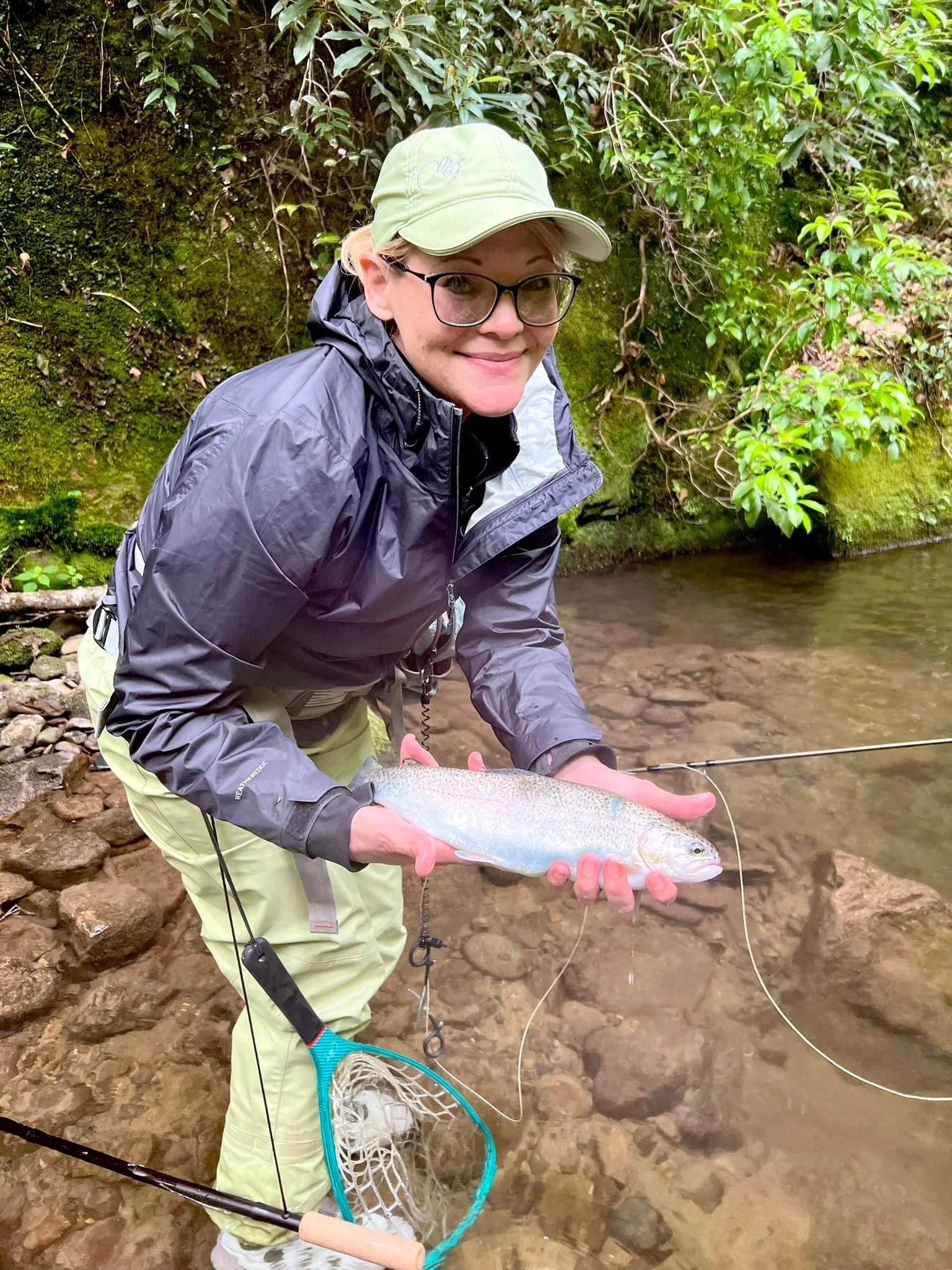 Kim Ranalla holding a fish she caught in Gatlinburg, TN