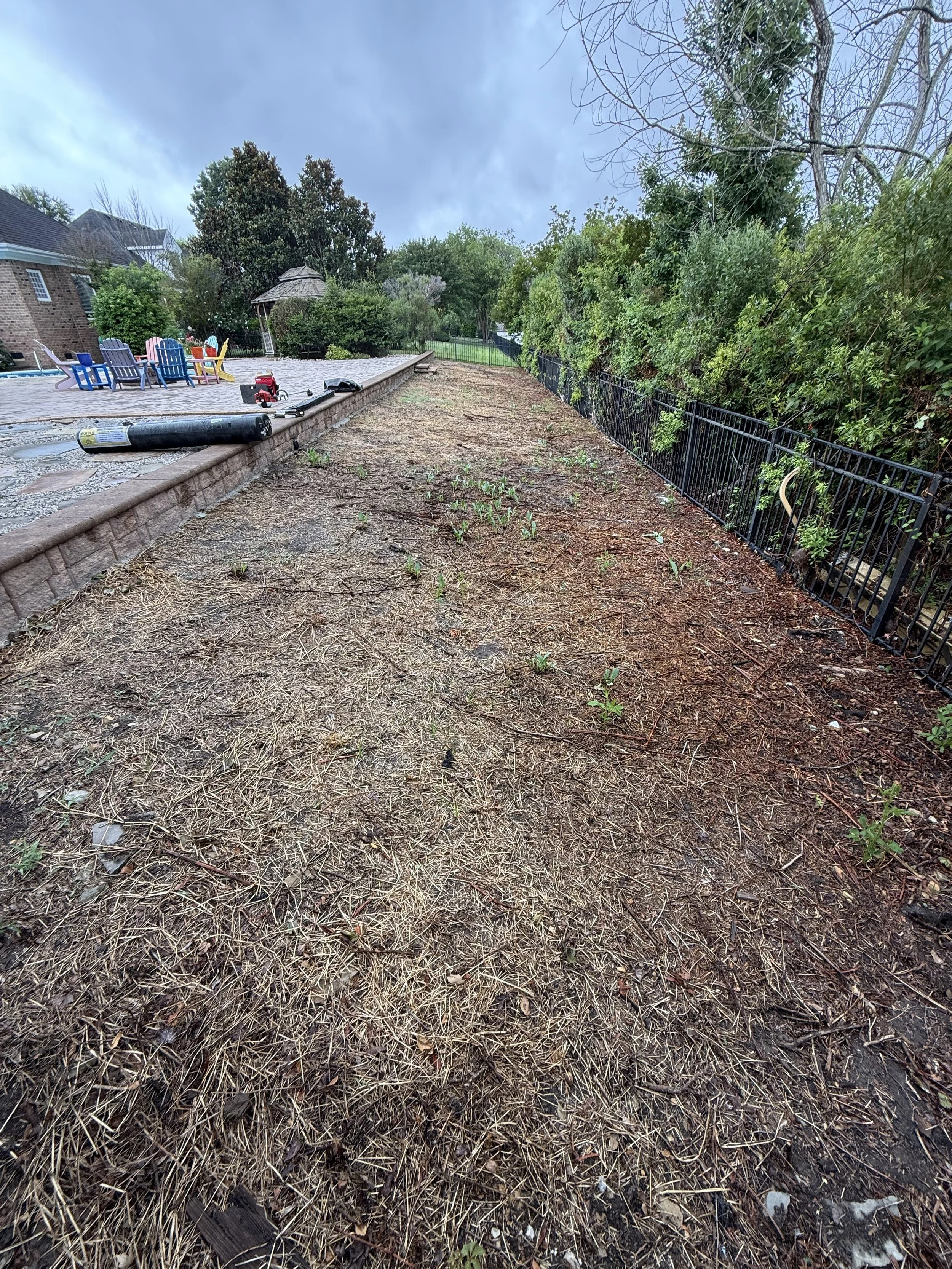Rock Install IMG 2. Result of removing the weeds and brush.
