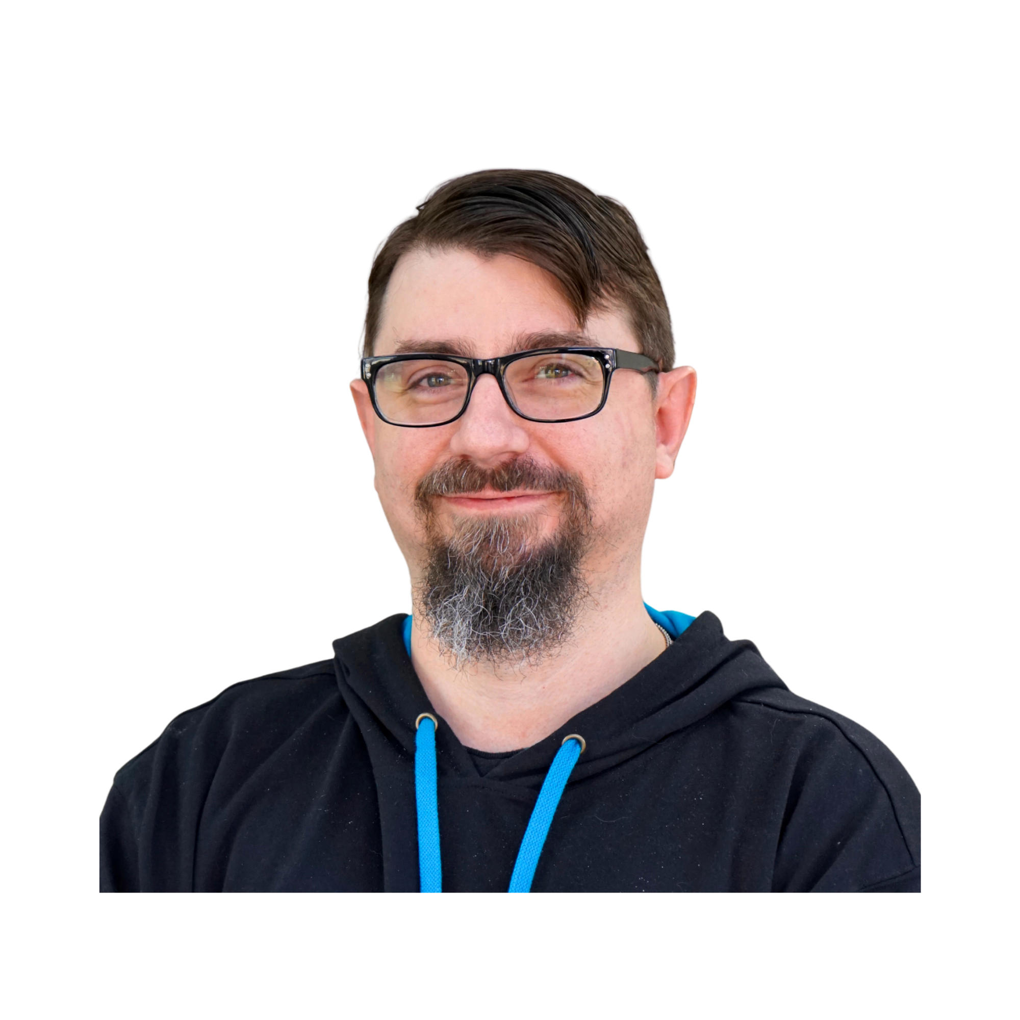 A man with glasses, facial hair, and a goatee smiling, wearing a black hoodie with blue drawstrings.