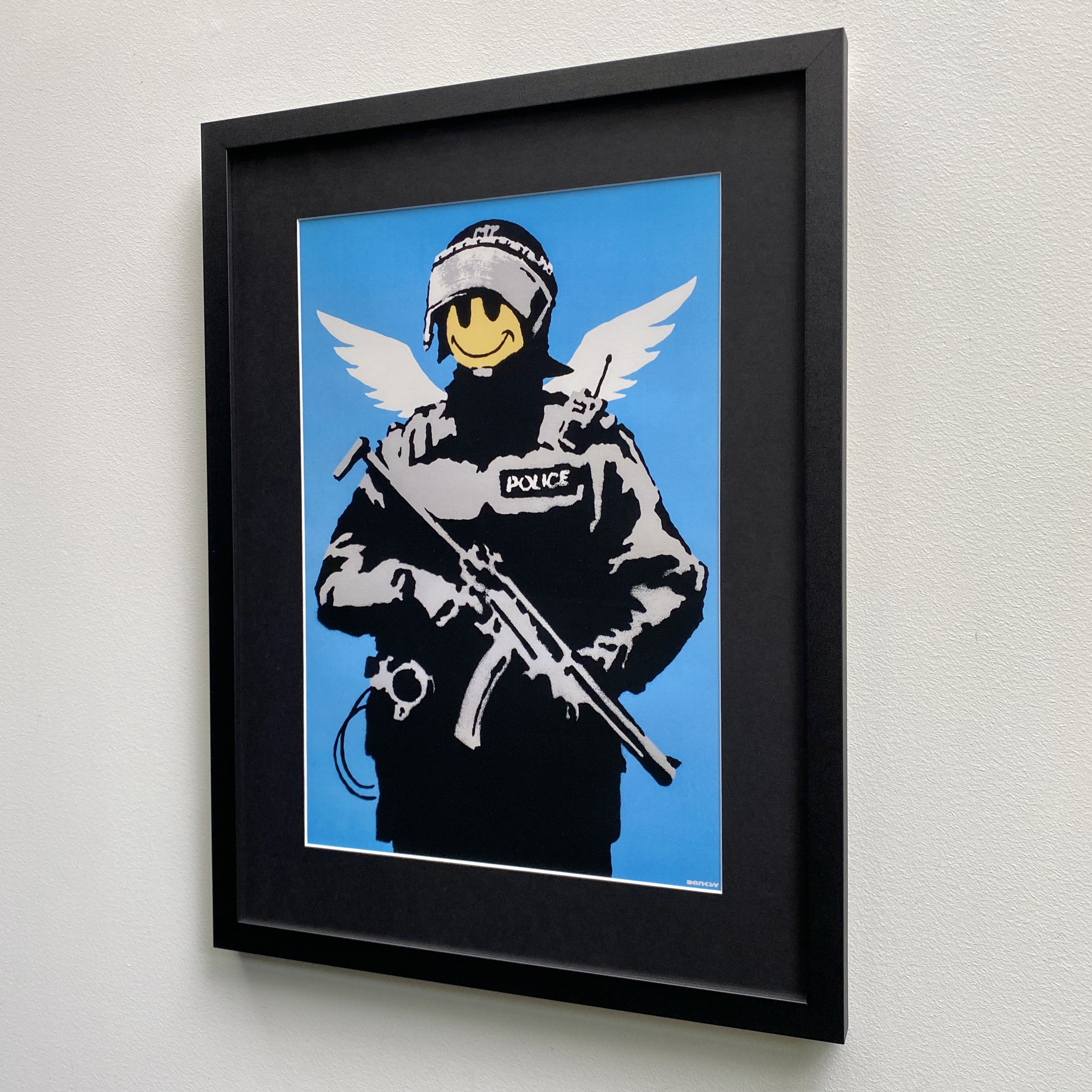 BANKSY: OFFICER FRIENDLY (F)