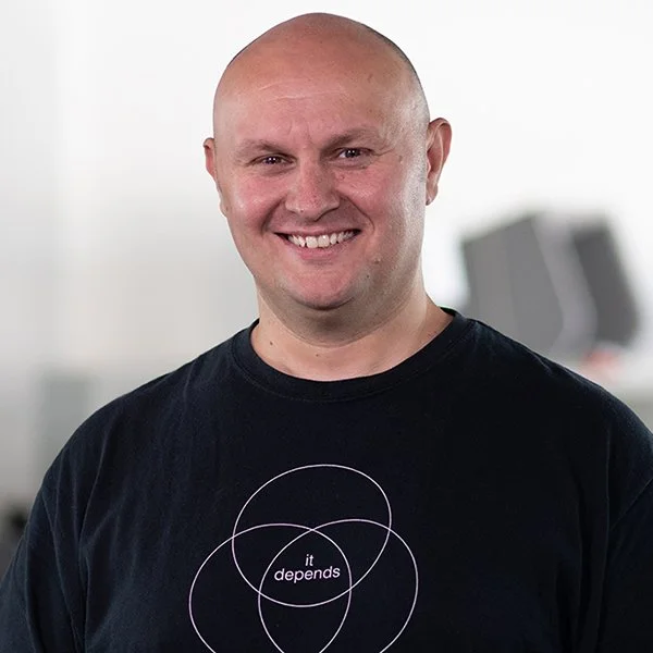 Headshot of Ben Pecotich