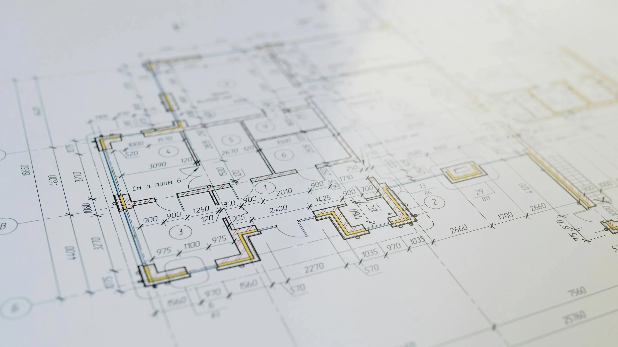 Architectural blueprint or house plan with detailed room measurements and layouts.