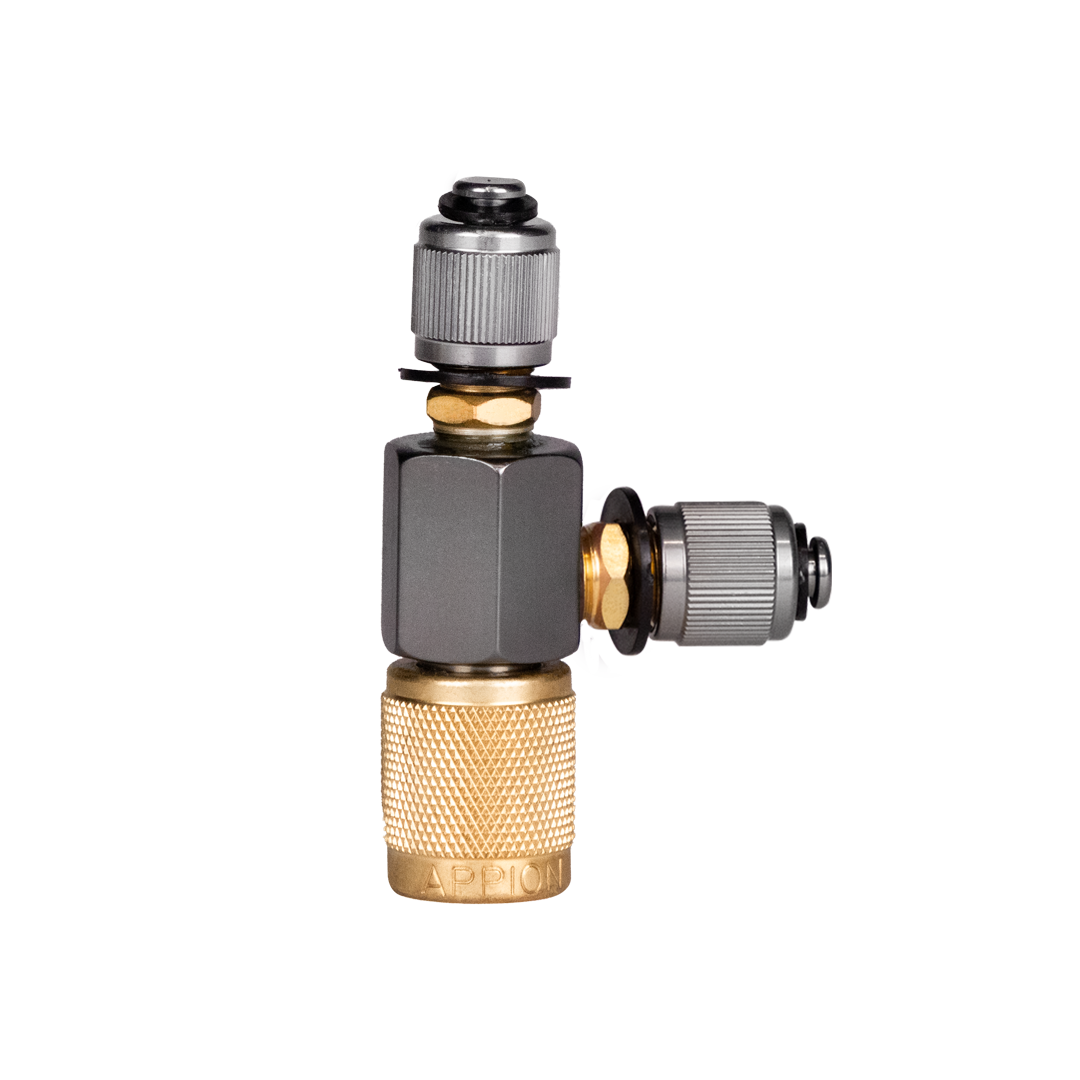 Close-up of a metal valve connector with black and gold components.