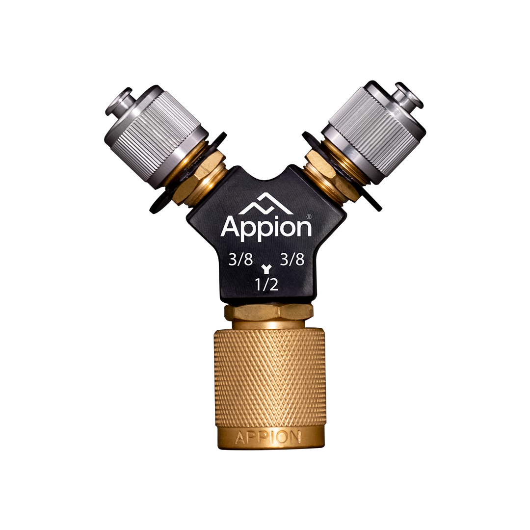 A brass and black metal Y-shaped garden hose connector with labeled adjustable spray settings.