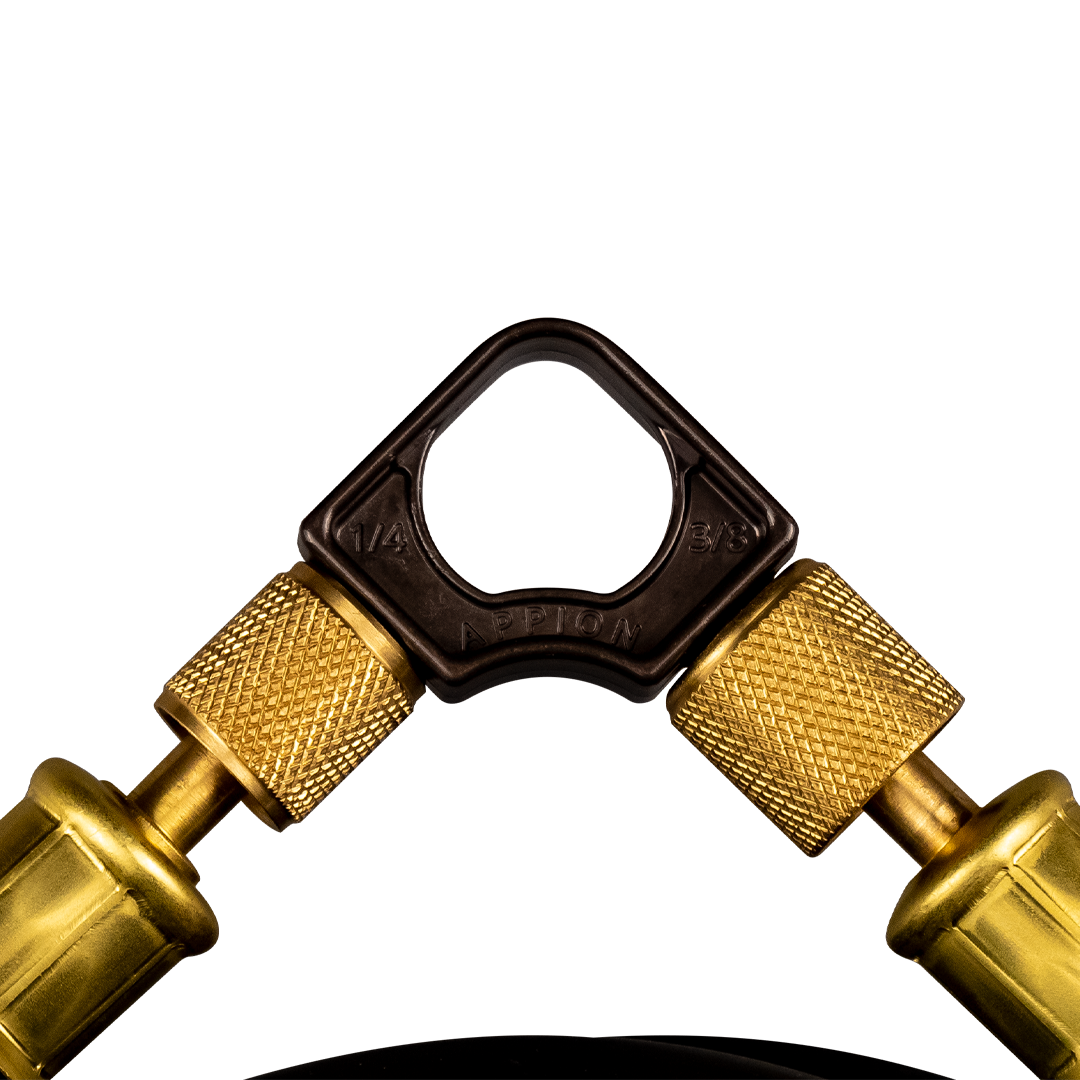 Gold and black tire pressure gauge with adjustable nozzles.