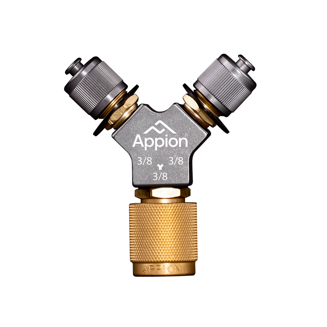 A metal Y-shaped hose connector with two adjustable valves, labeled 'Appion' and '3/8', against a black background.
