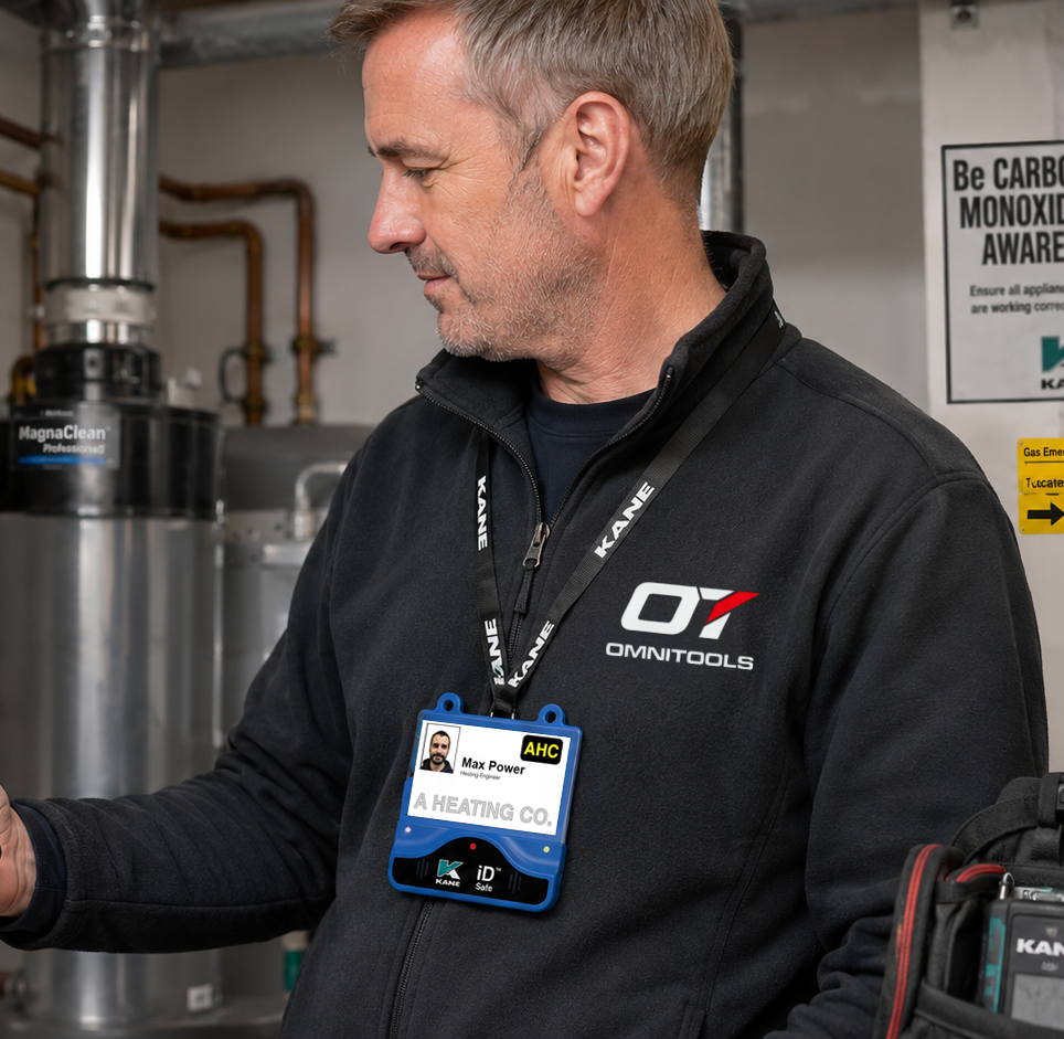 Technician wearing the KANE78 carbon monoxide alarm and ID card holder on site