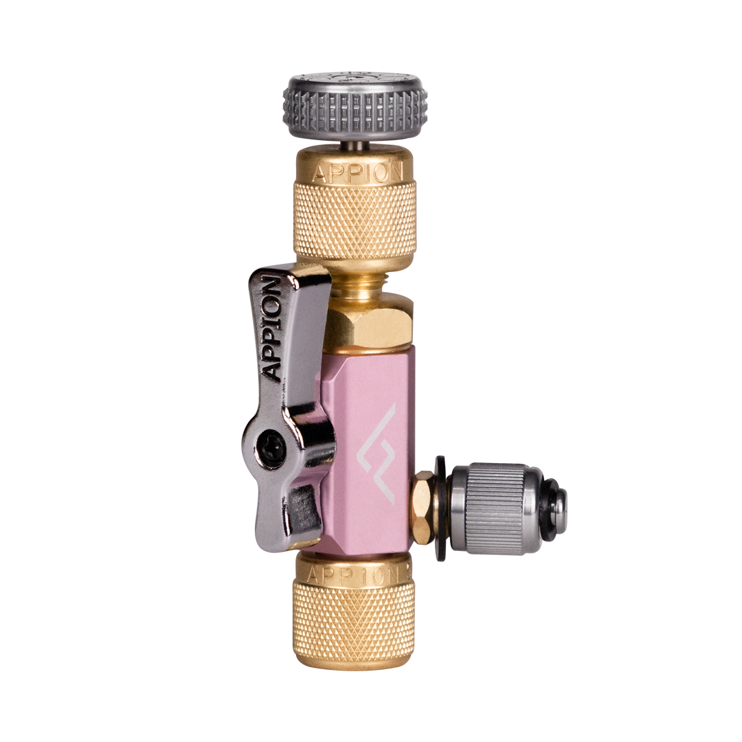 A hydroponic valve with pink, gold, and silver components, including a pink body, gold and silver fittings, and an attached silver lever.