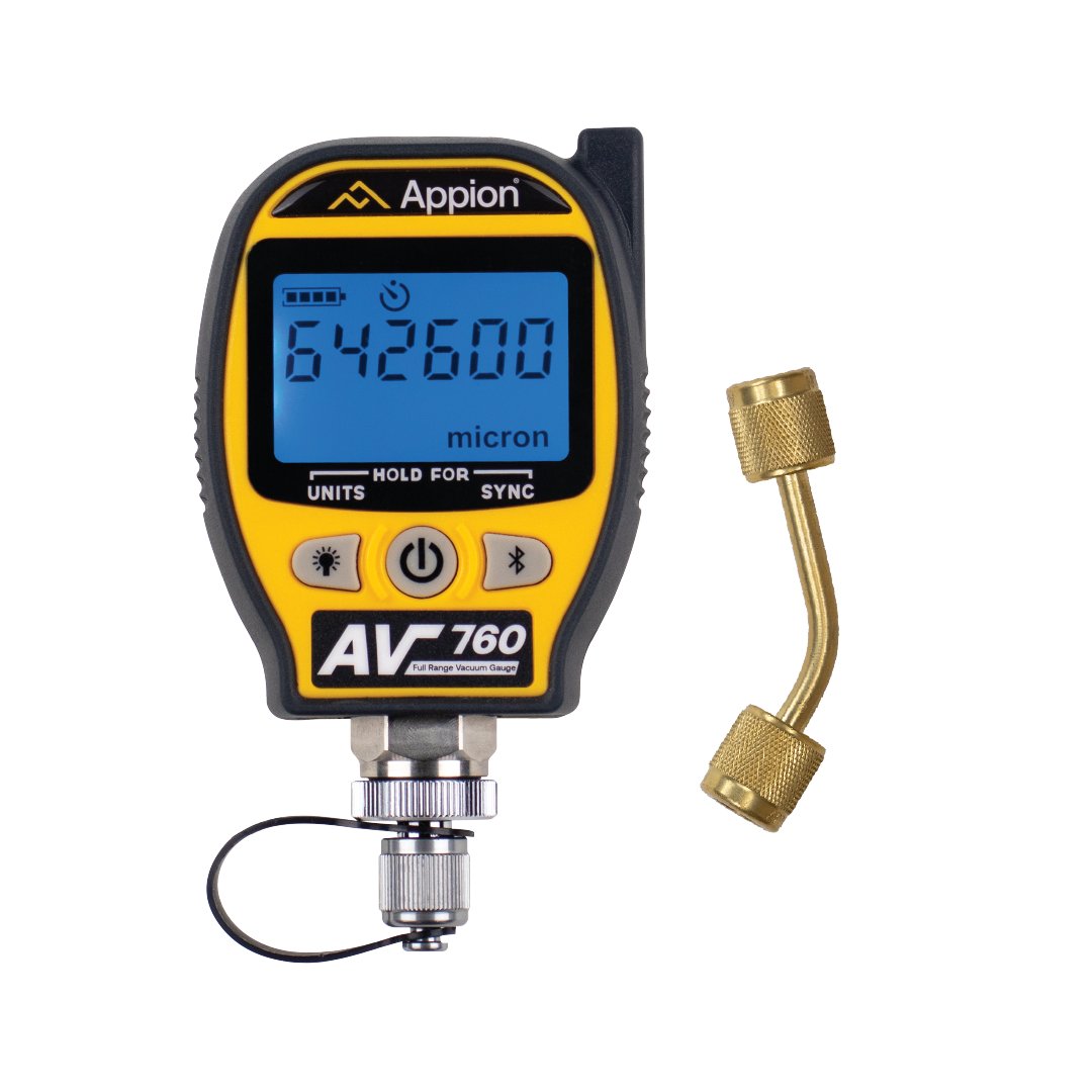 Digital vacuum gauge with a yellow and black body, displaying a reading of 642600 microns, and a brass attachment.