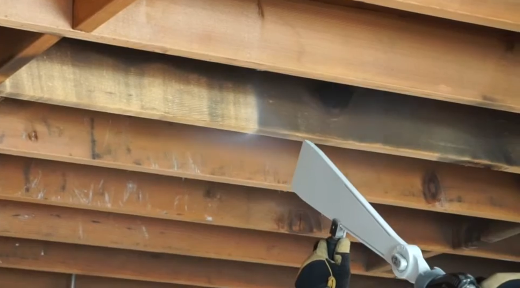 Removing soot from joist using dry ice cleaning