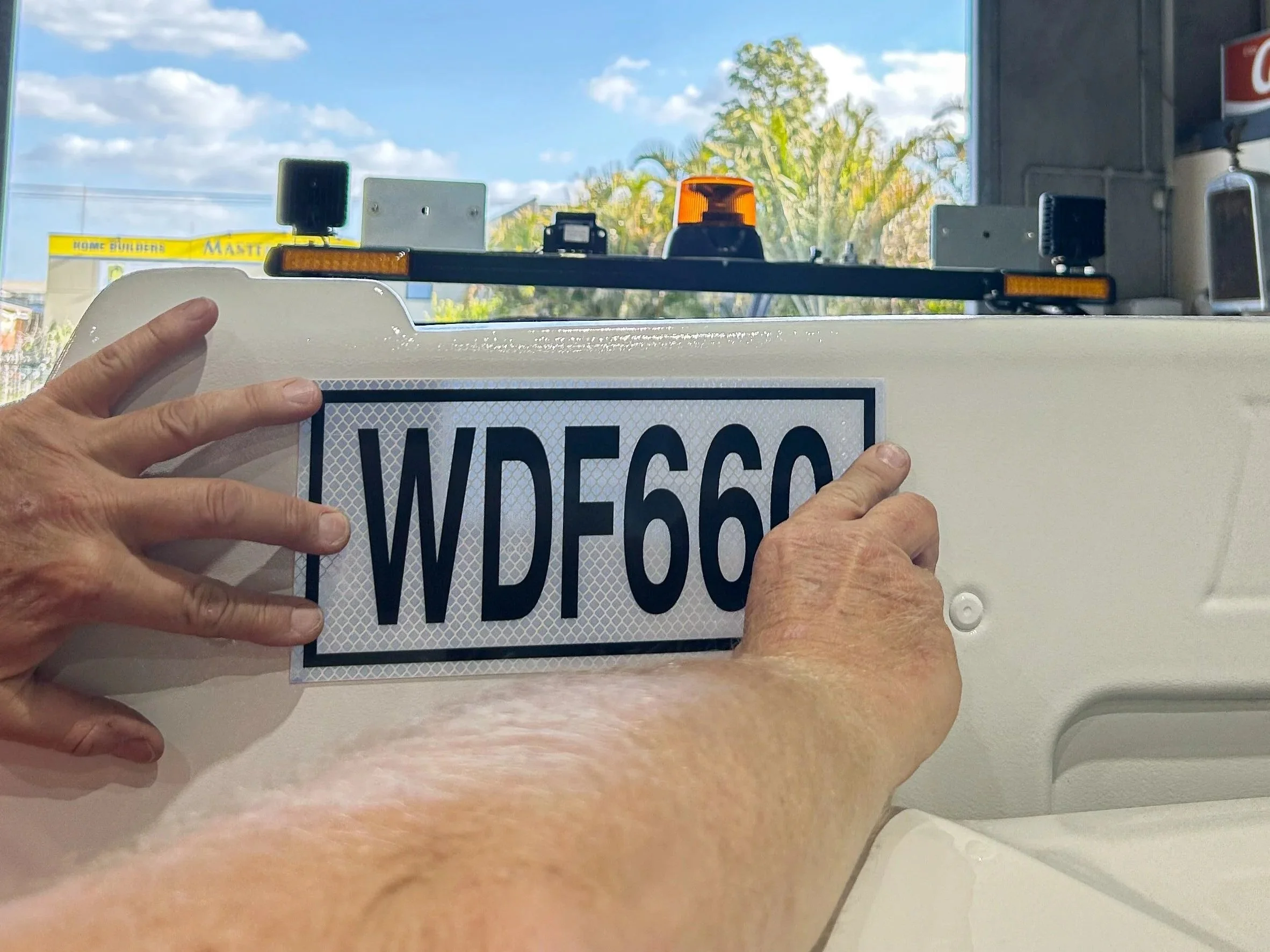 Installation of 'WDF660' Asset Number onto a fleet service vehicle for Mining. Vehicle Branding