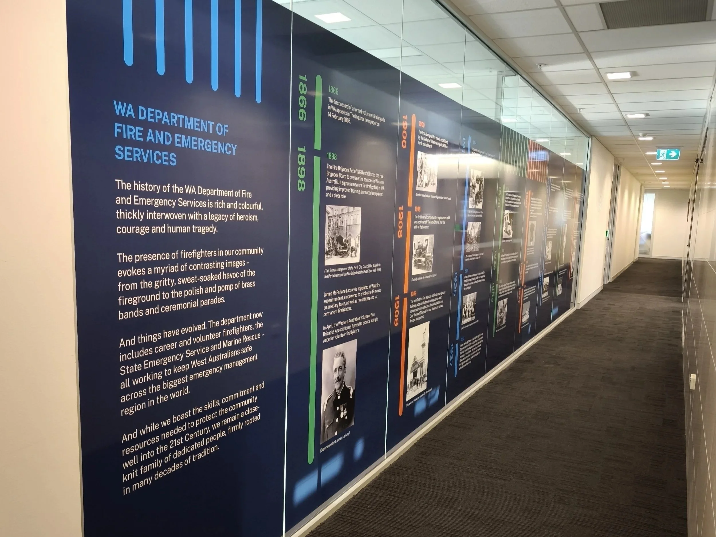 Timeline display wall graphics about the history of the WA Department of Fire and Emergency Services, with sections highlighting key dates, historical events, and black-and-white photographs.