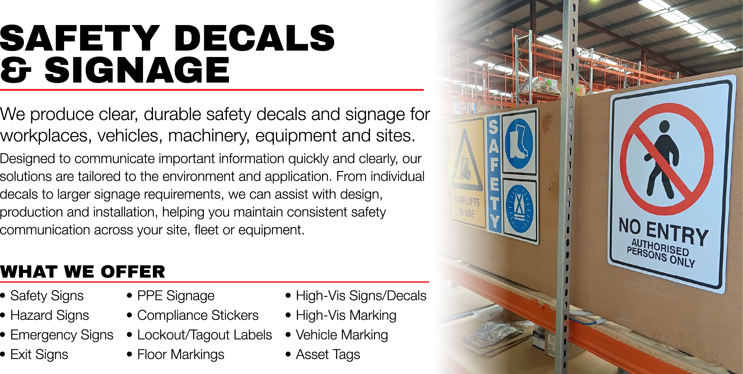 A display of safety signage and decals on a warehouse wall, including a no entry sign, safety instructions, and various safety-related icons.