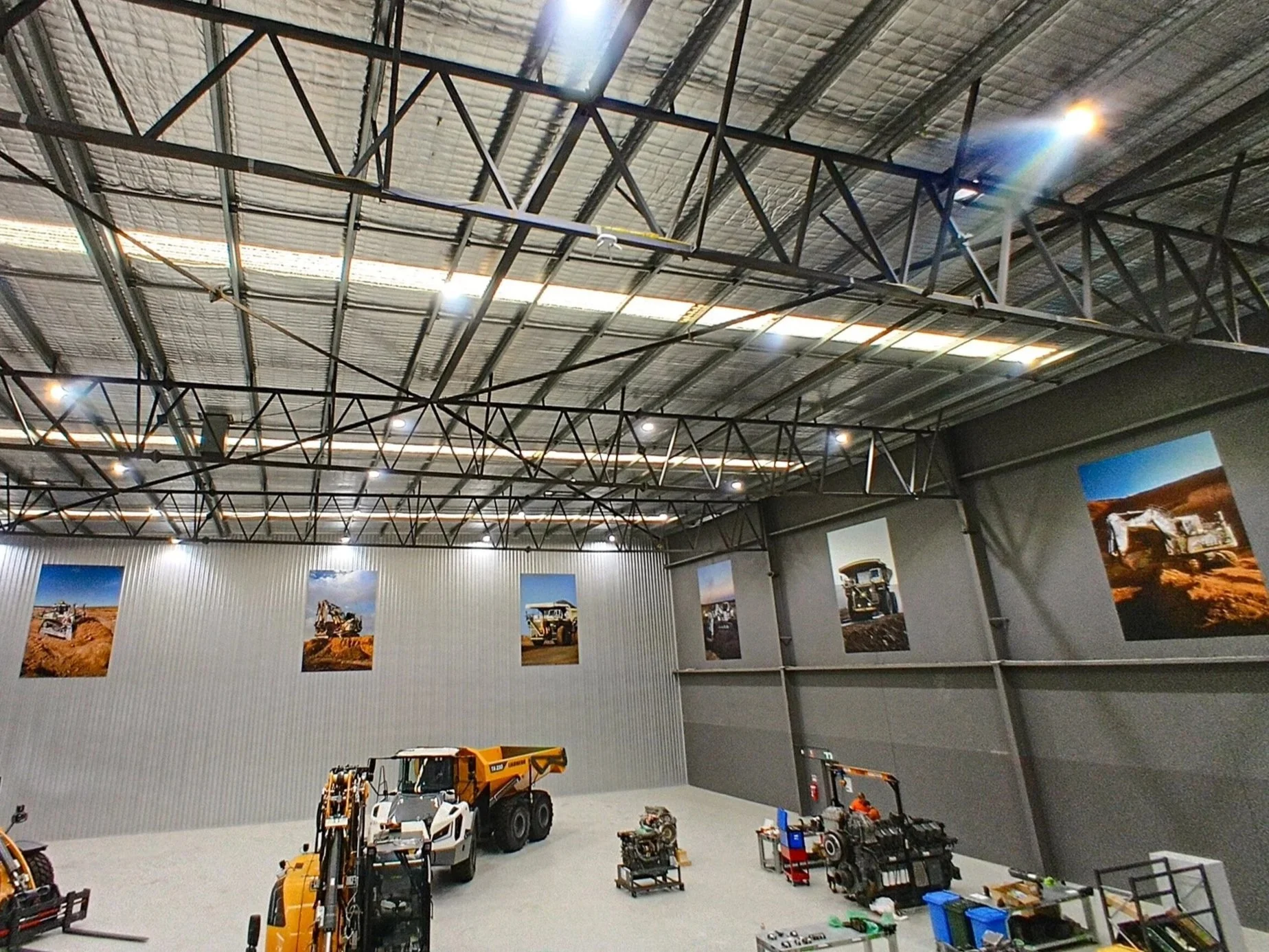 Indoor Workshop Signage for Liebherr at Bushmead Rd, Hazelmere WA 6055. Hazelmere Commercial Signage. Hazelmere Workshop Signage. Commercial Signage Perth. Workshop Signage Perth. Mining Signage Hazelmere. Machinery Photos Perth, WA