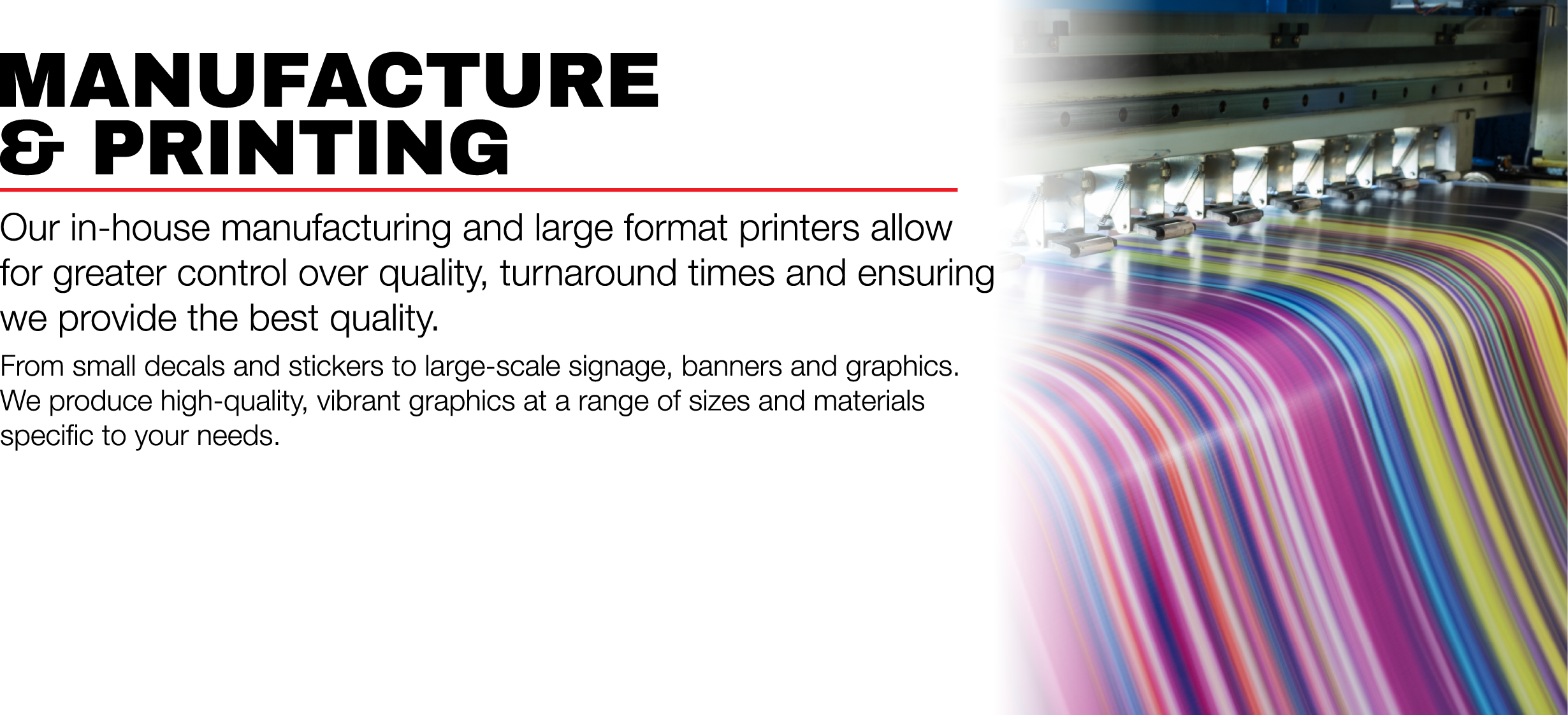 A printing machine producing vibrant, colorful graphics on large sheets of material.