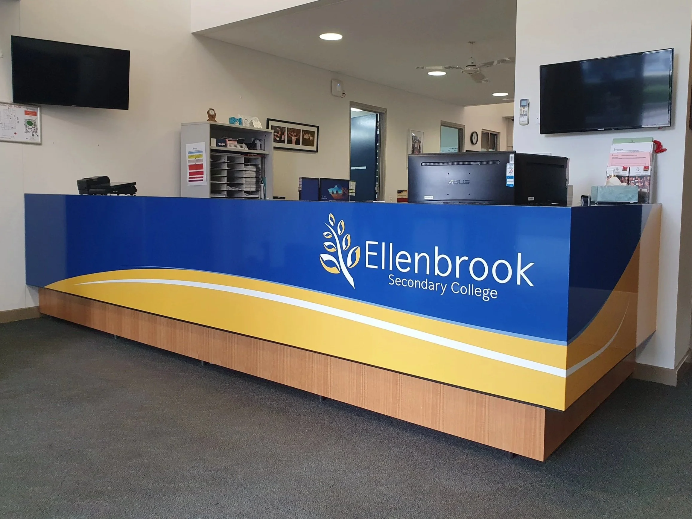 Reception desk at Ellenbrook Secondary College. Ellenbrook reception signage. Ellenbrook Desk Signage. Ellenbrook Indoor Signage. Perth Reception Signage. Perth School Signage. Student Services Signage Perth. Office Signage Perth. Signage Ellenbrook