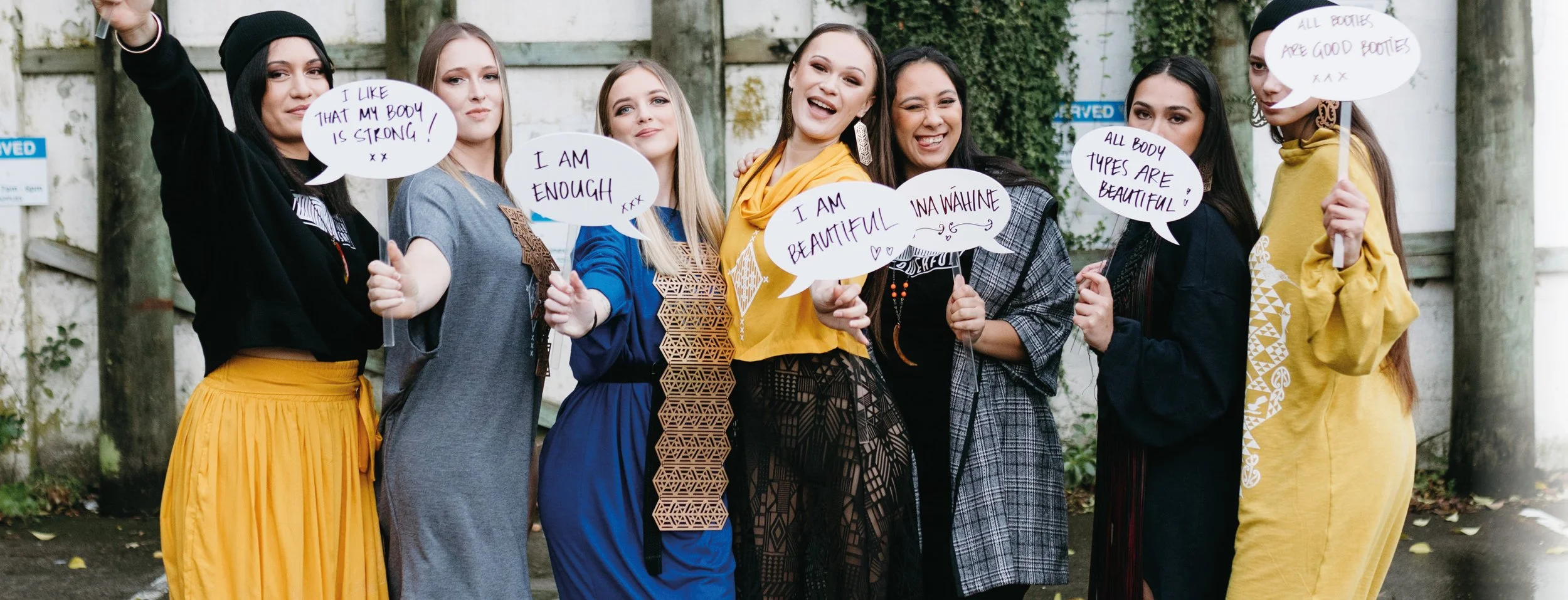 Image: Ahau - this is me picture of models wearing the ahau collection. This image speaks to silencing the negative voices in our head.  The imposter syndrome... which I can feel when doing research.