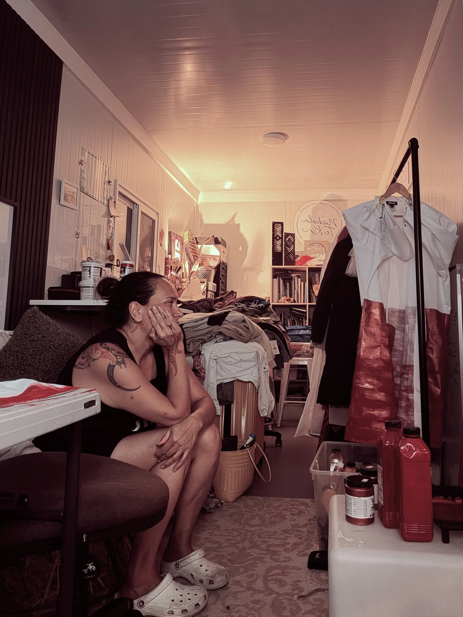 Image: Me (Nichola) in my tari container at home. It speaks to my practice-led research.  Here I am in the midst of my creative space working through an idea.