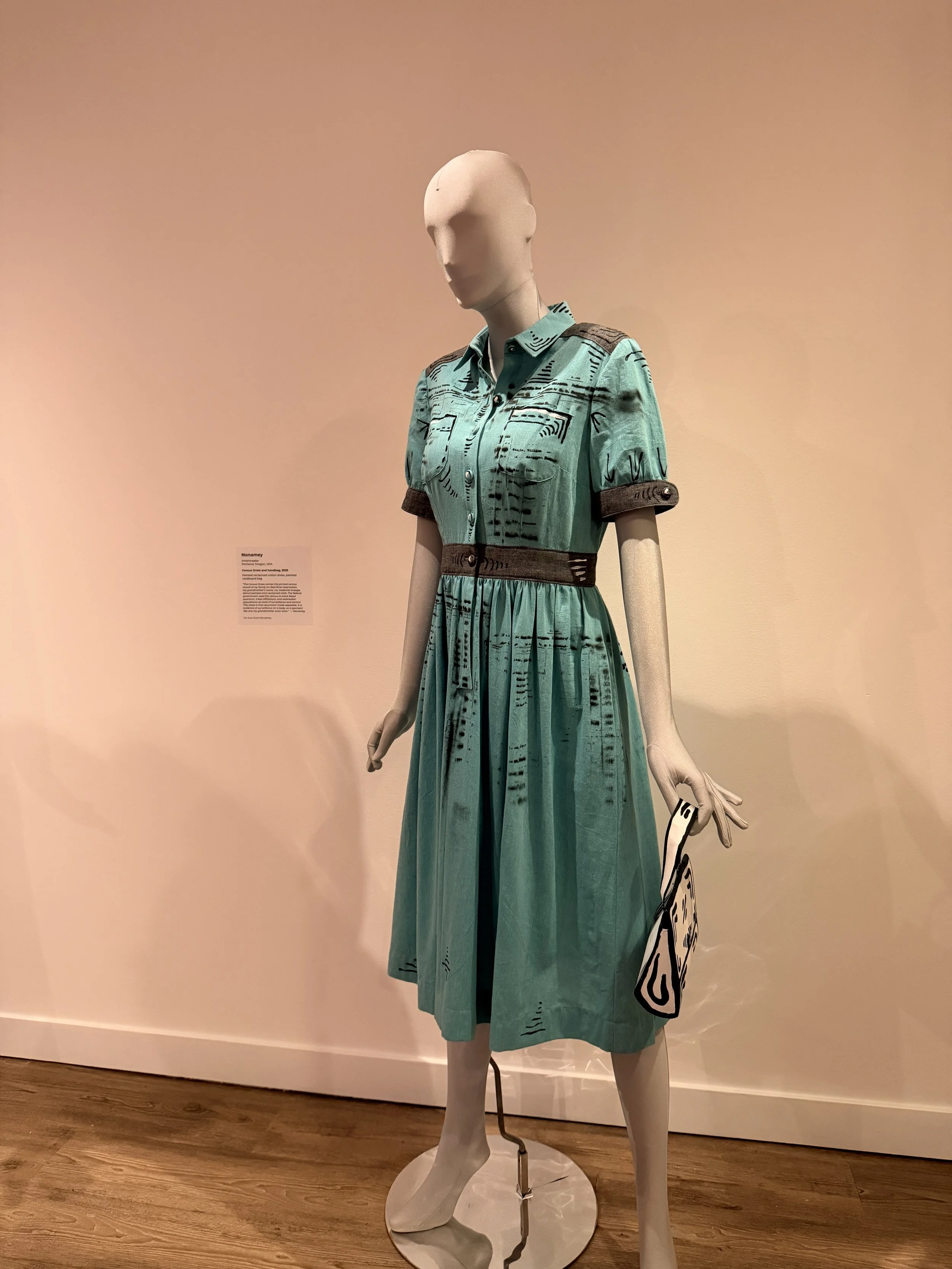 Image: Dress and bag by designer Nonamey - Anishinaabe, Portland, Oregon, USA. And it speaks to Blood quantum. Blood quantum fractures genealogy, Kauanui (2008).