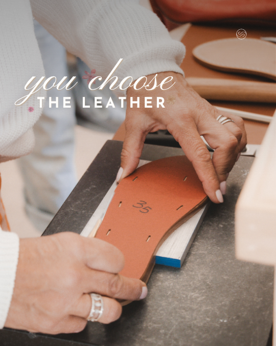 Close-up of hands working on a leather shoe sole in a workshop, with text overlay 'you choose the leather'.