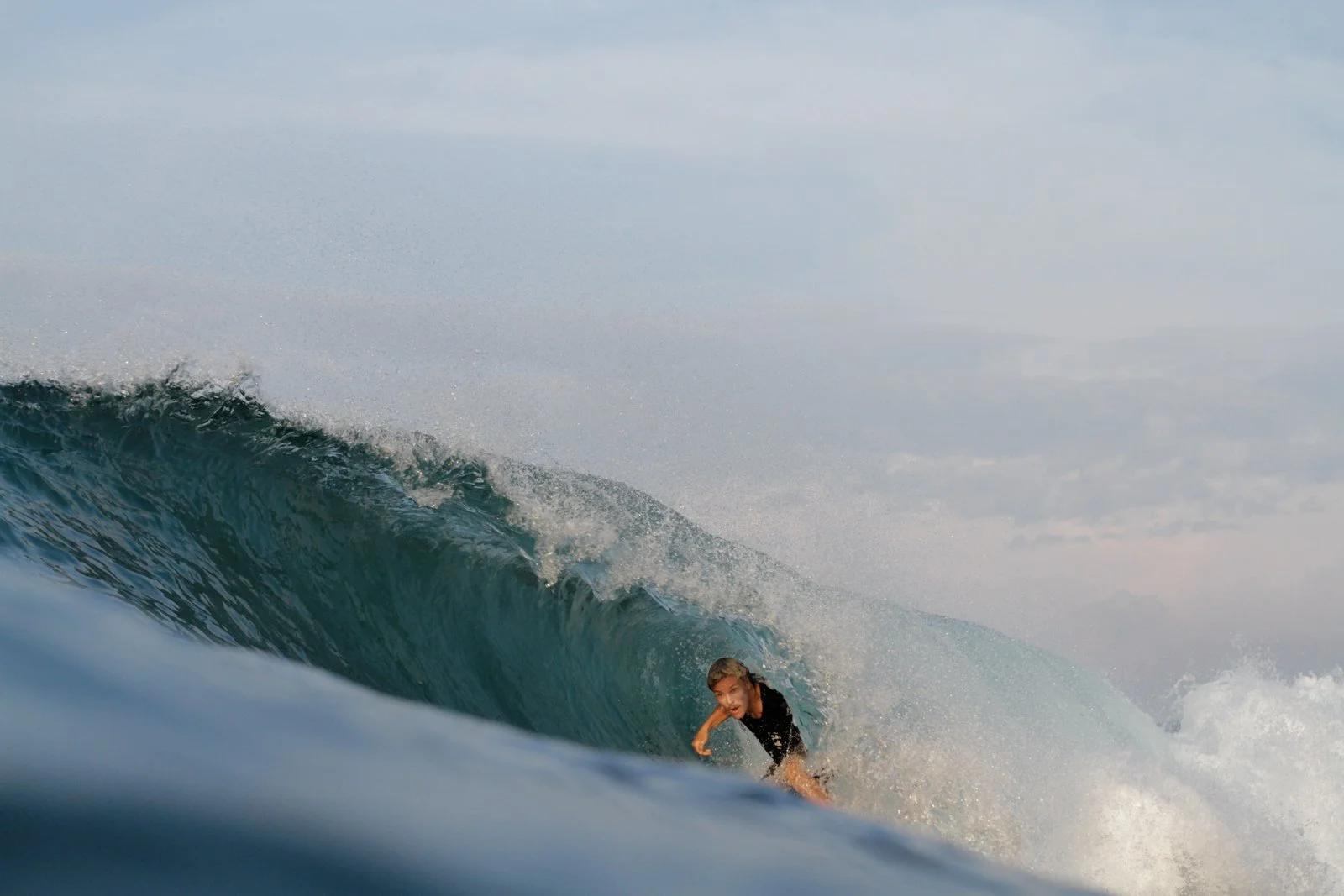 Sam Ayton, Shortie Surfboard shaper, getting barrelled in Sri Lanka on a custom surfboard.