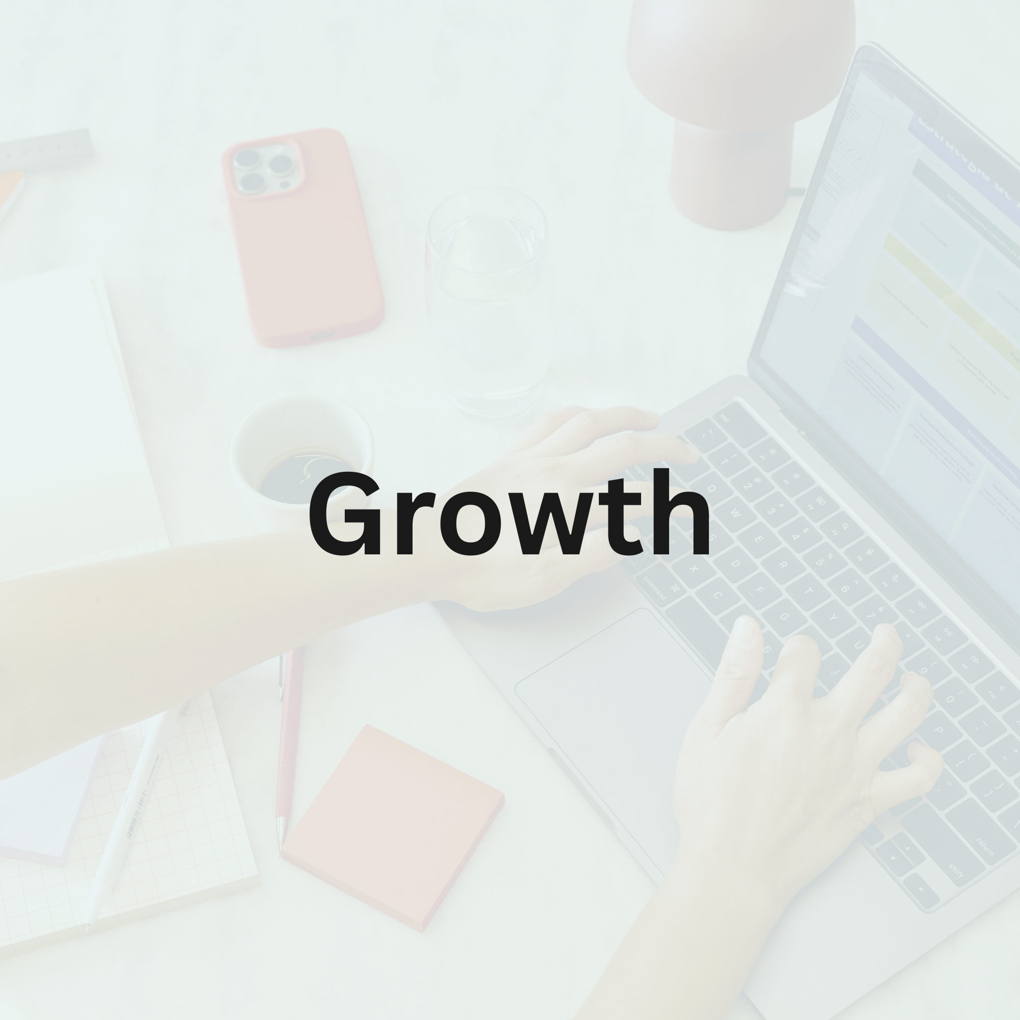 A person typing on a laptop at a desk with a coffee cup, glass of water, phone, notepad, and pen, with the word 'Growth' overlaid.