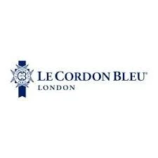 Le Cordon Bleu London logo featuring a blue emblem with a chef's hat and culinary tools