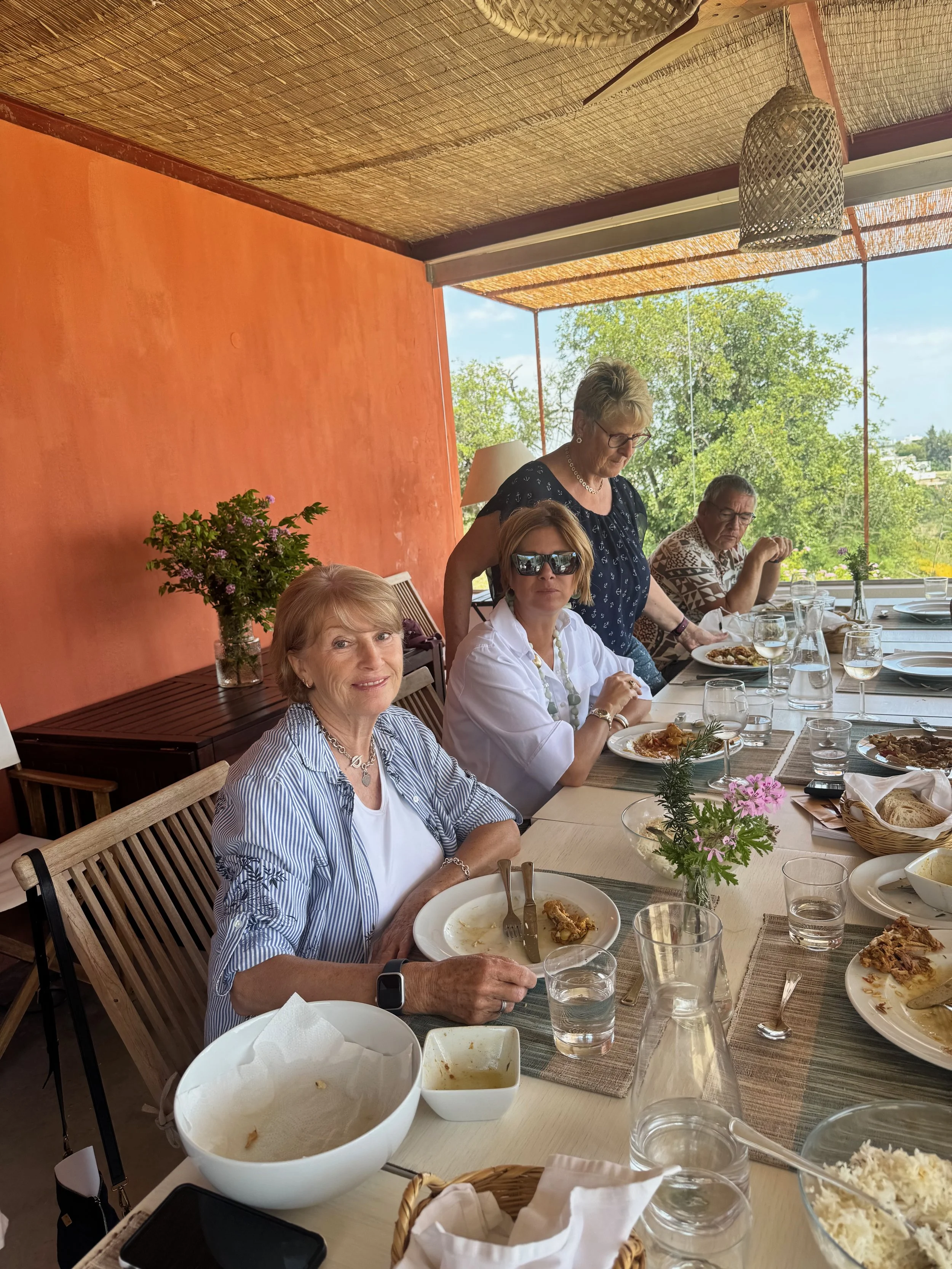 Guests enjoying a shared meal after an Indian cooking class led by Chef Sarita Bhagwat, an Indian culinary instructor offering hands-on cooking workshops and authentic Indian cuisine.