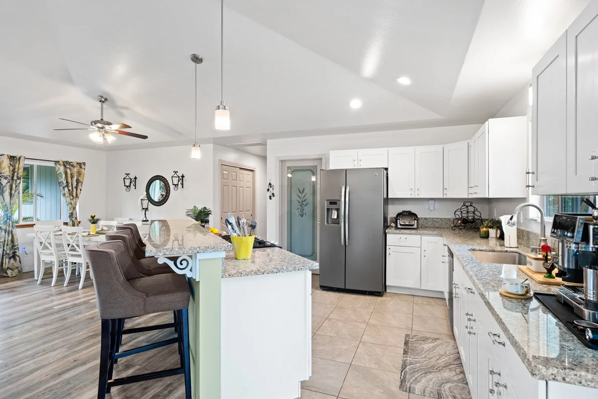 Kitchen, Dining Room and Pantry in Livingly Cared For Property In Keaau Hawaii on one acre