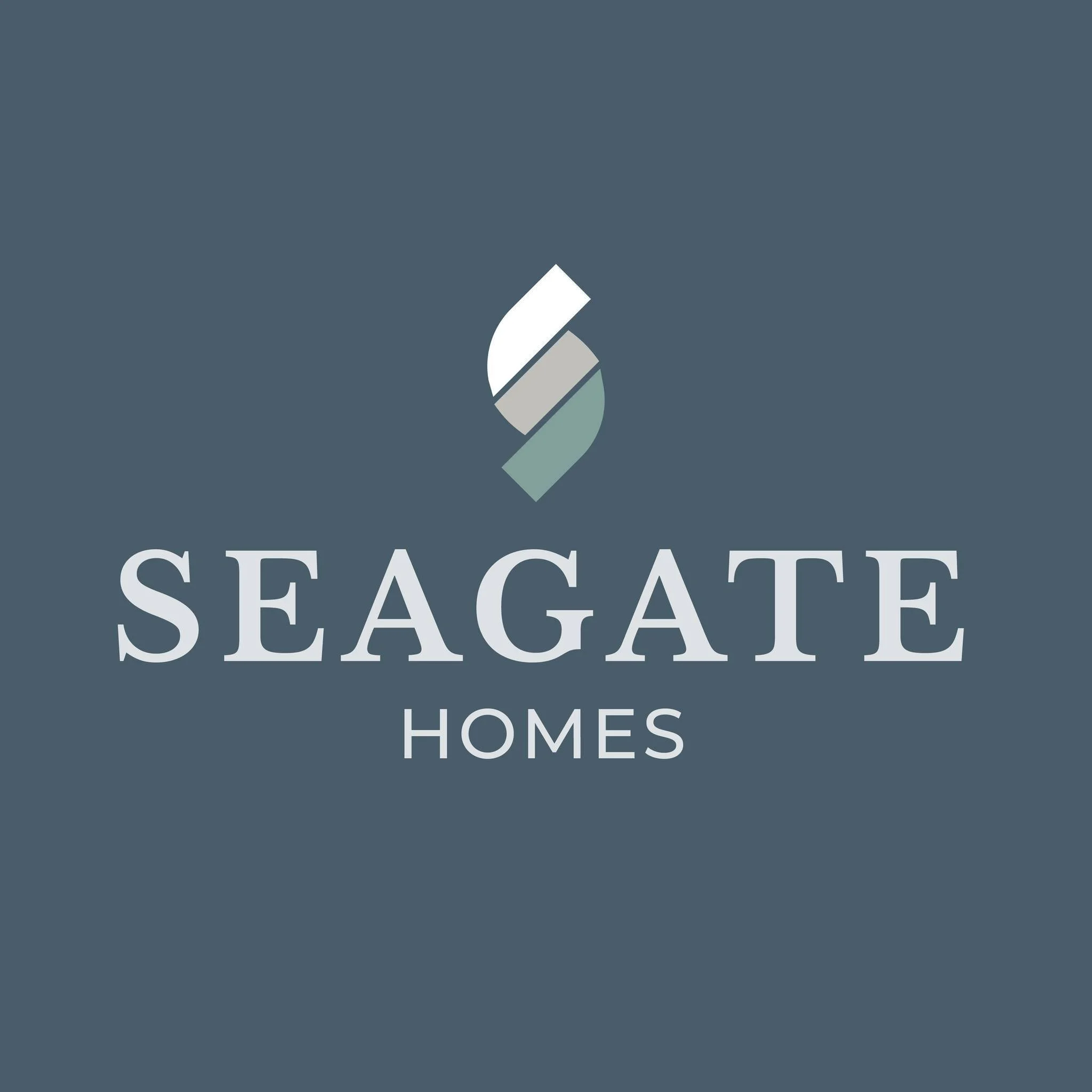 Stylized logo with a droplet shape and the words 'Seaside Homes' beneath it.