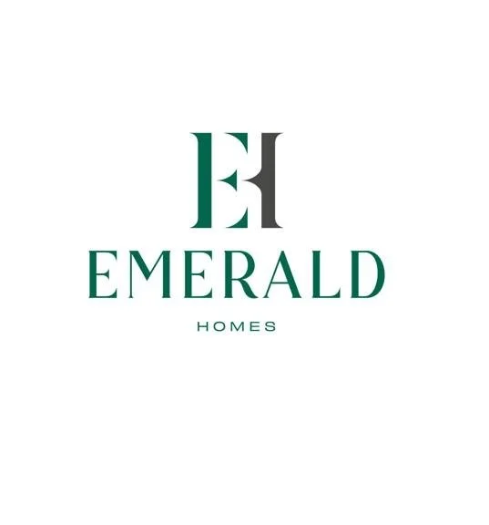 Logo for Emerald Homes featuring a large stylized letter 'E' and the words 'Emerald Homes' in green.