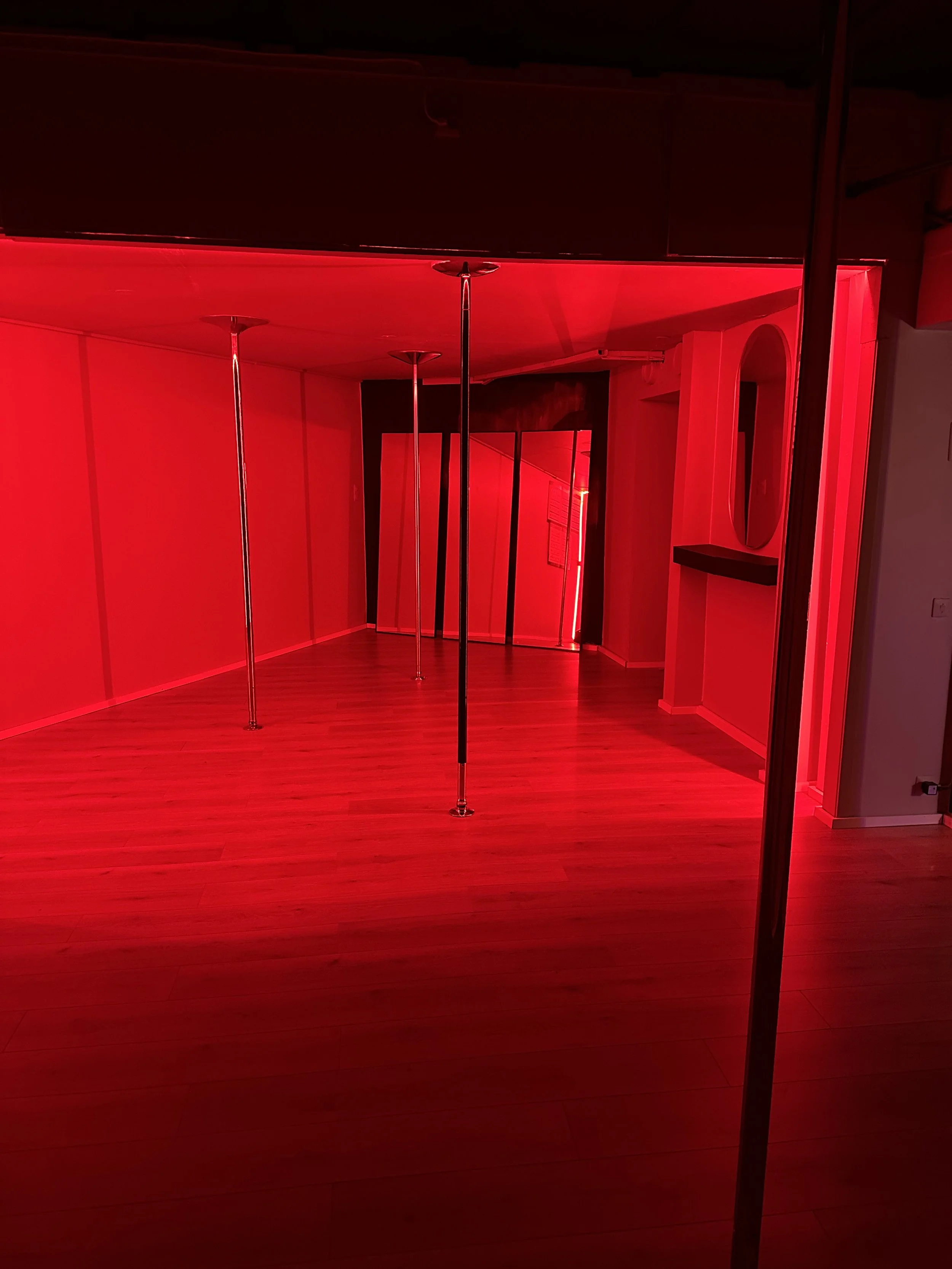 The Pole studio. The image shows the studio with a red light that covers the entire room.
