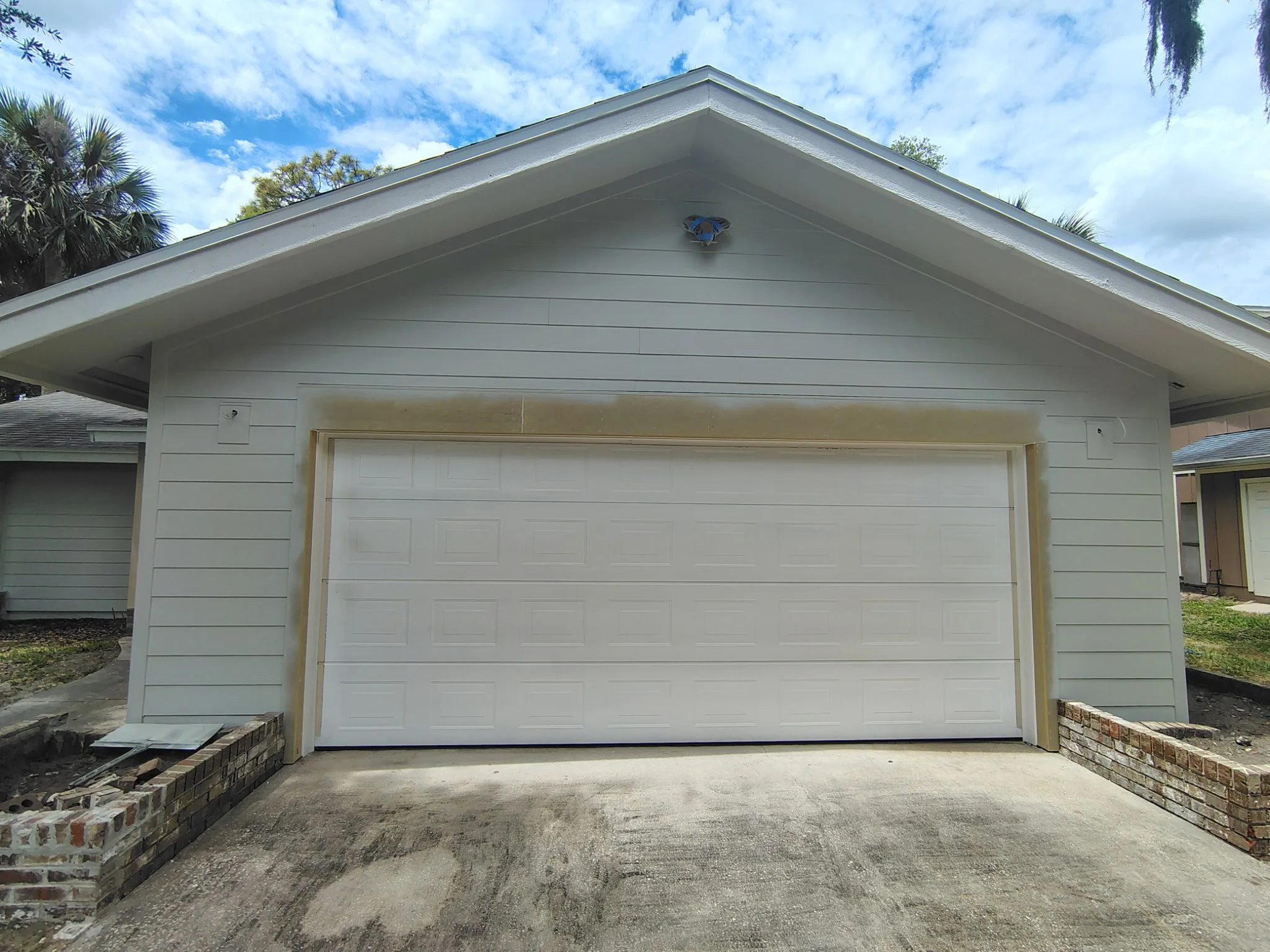 Garage exterior painting prep work in Port Orange Florida