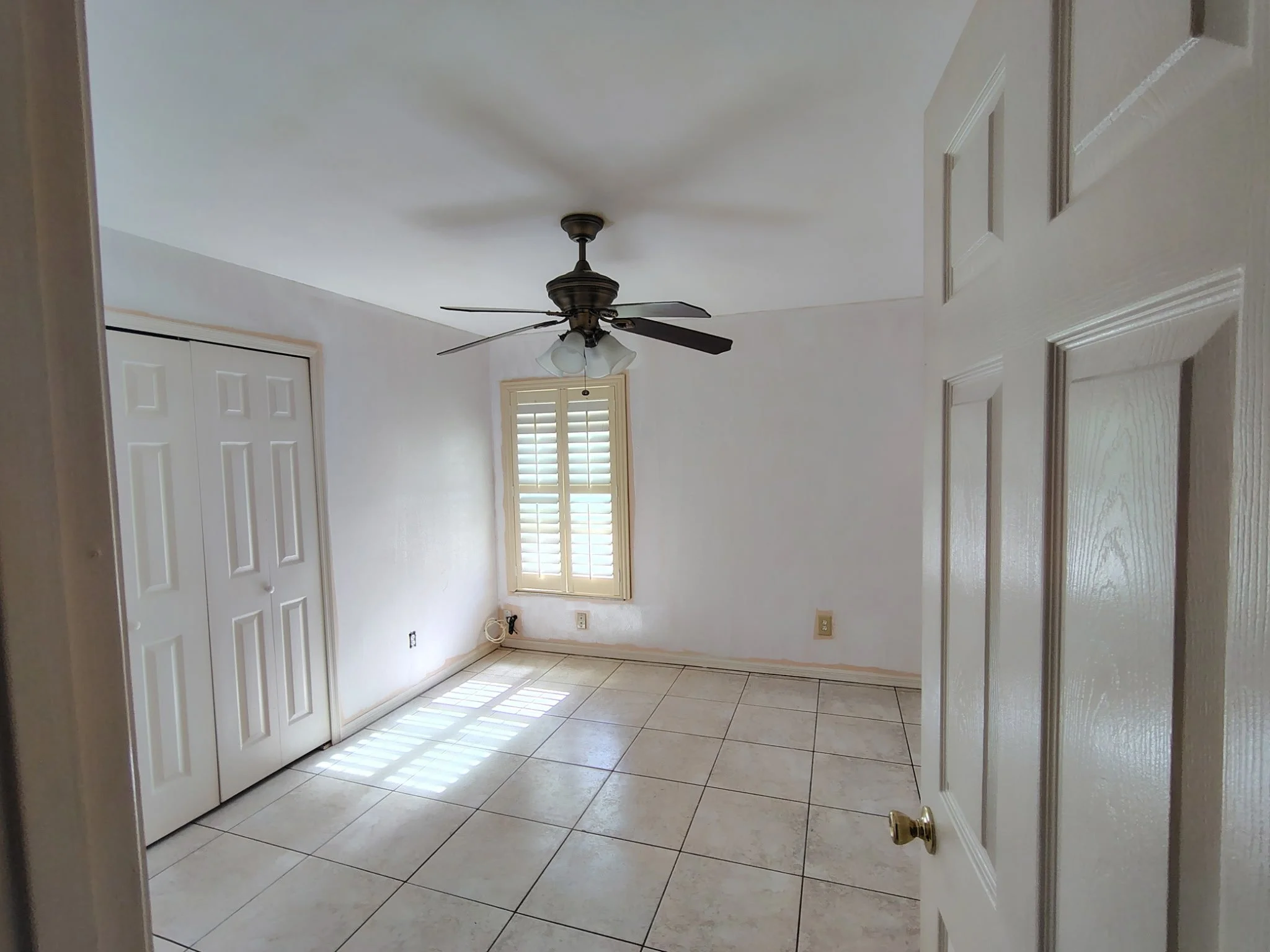 Smoke restoration bedroom with Kilz primer and fresh interior repaint in Winter Garden FL