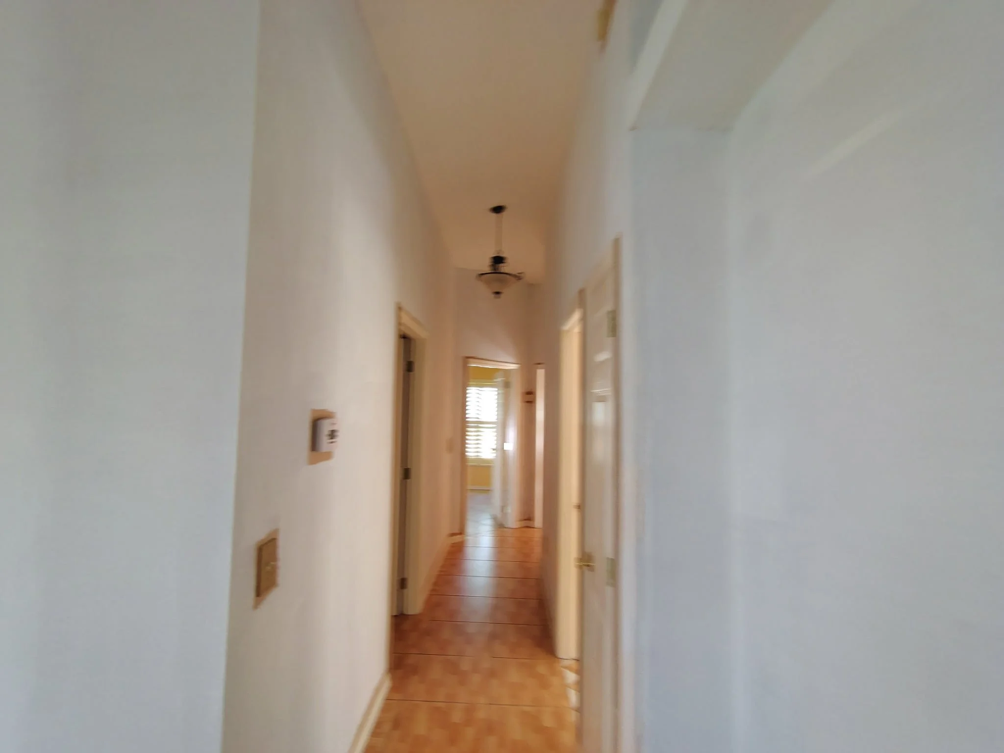 Interior hallway repaint during smoke restoration project in Ocoee Florida