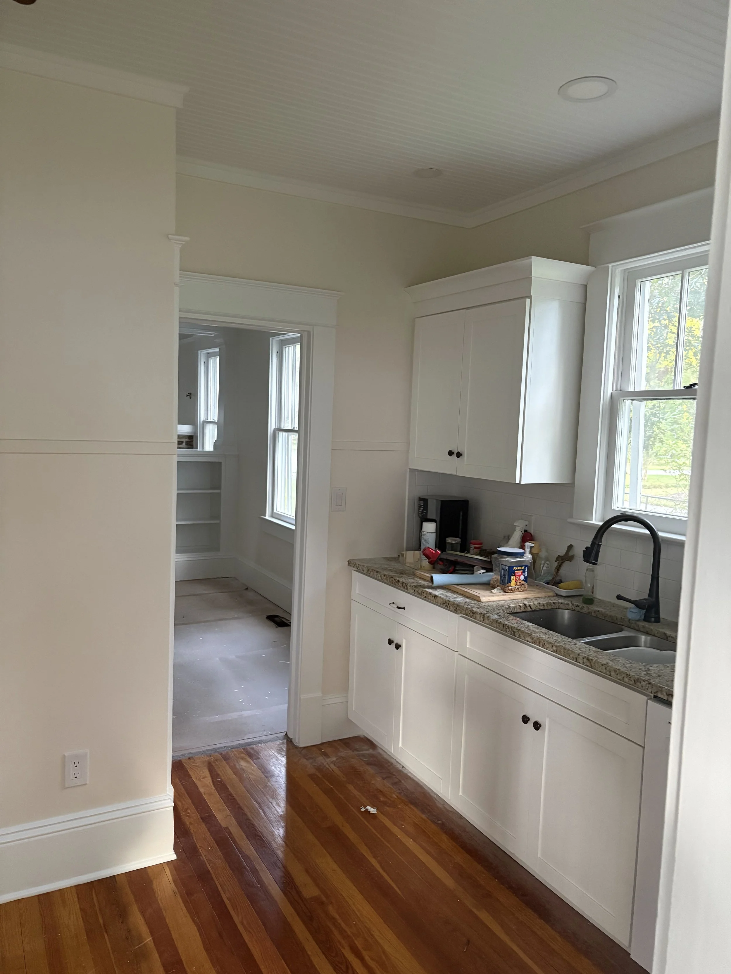 Detailed interior wall finish — even coats and soft white tones bring elegance to this Deland home