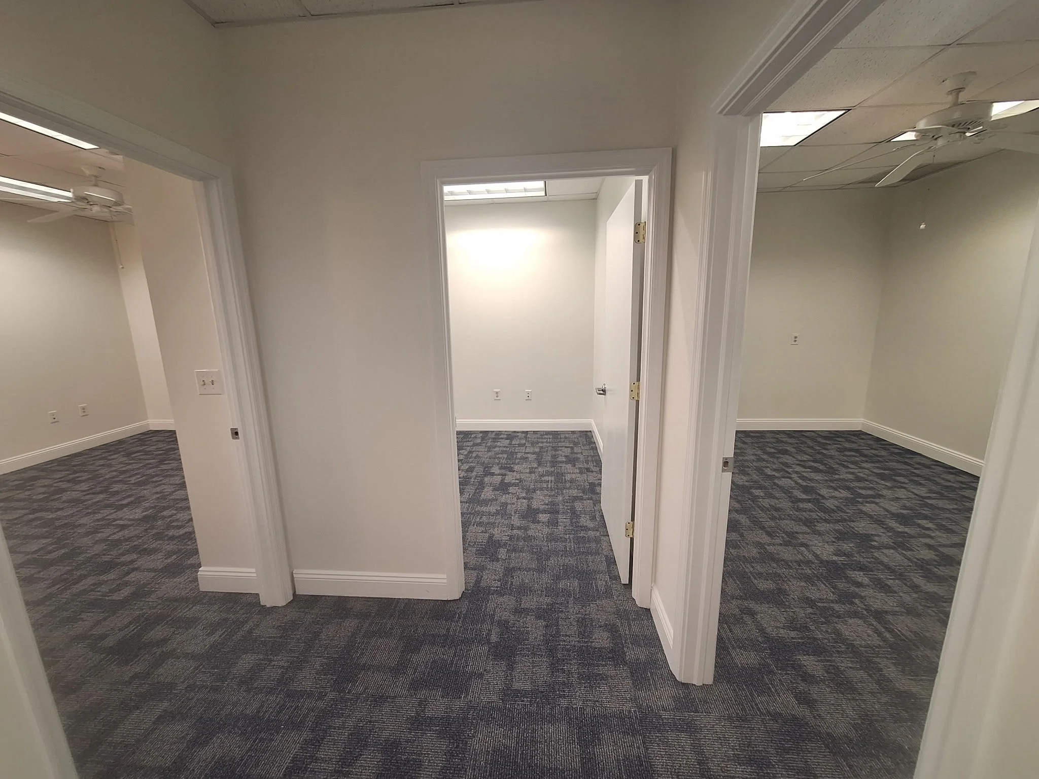 This image highlights consistent interior painting throughout multiple office spaces at a DeLand attorney’s office. Clean lines, smooth finishes, and professional color selection bring visual consistency across the workspace.