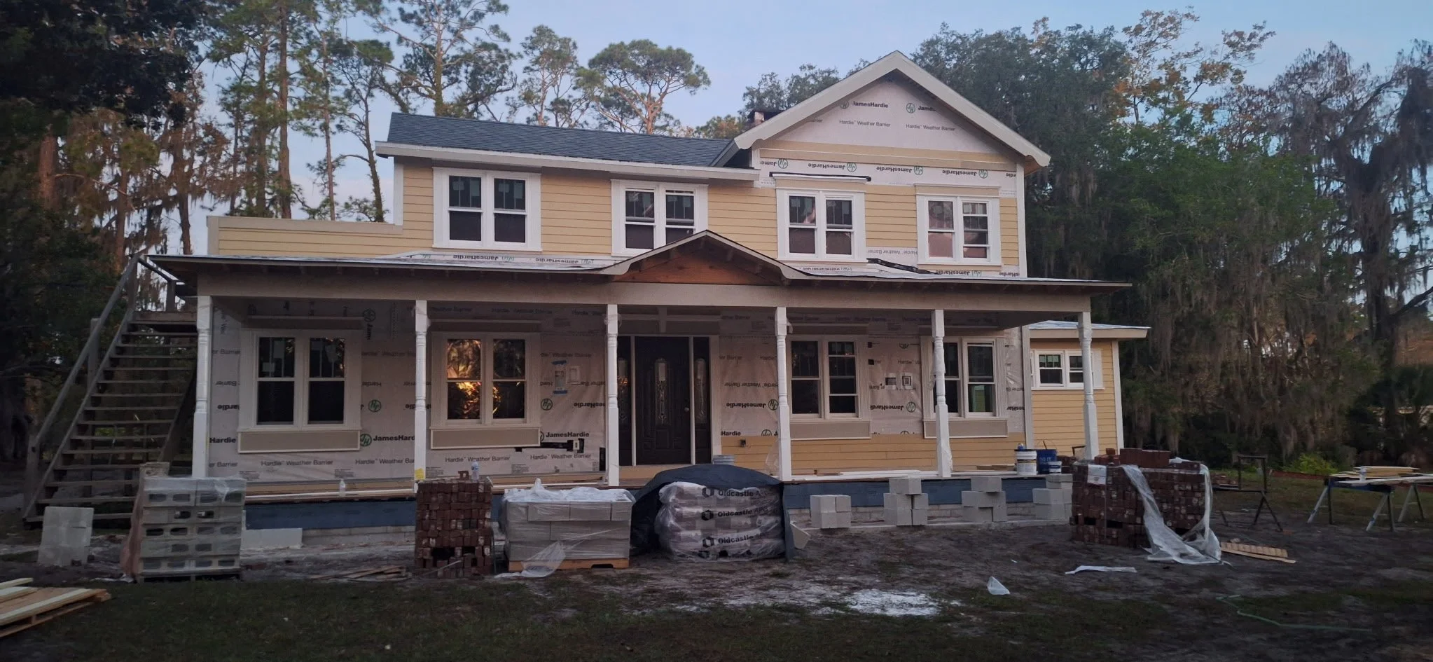 Exterior house painting project in Pierson, FL featuring Hardie board siding, professional prep work, and trim installation by local painters. Front exterior painting project in Pierson, FL showing Hardie board siding, detailed prep, and professional