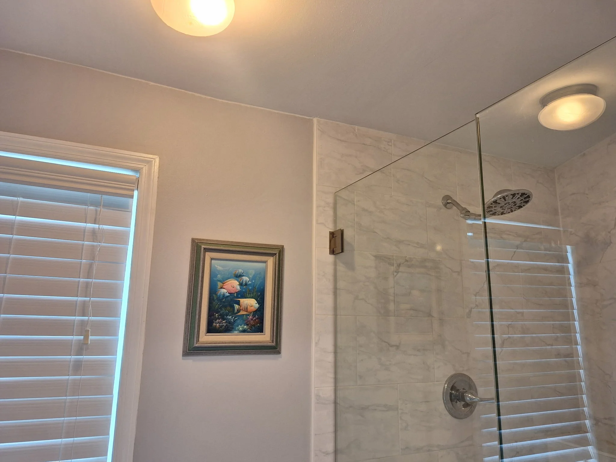 Bathroom interior painting in East Colonial Orlando with light neutral walls