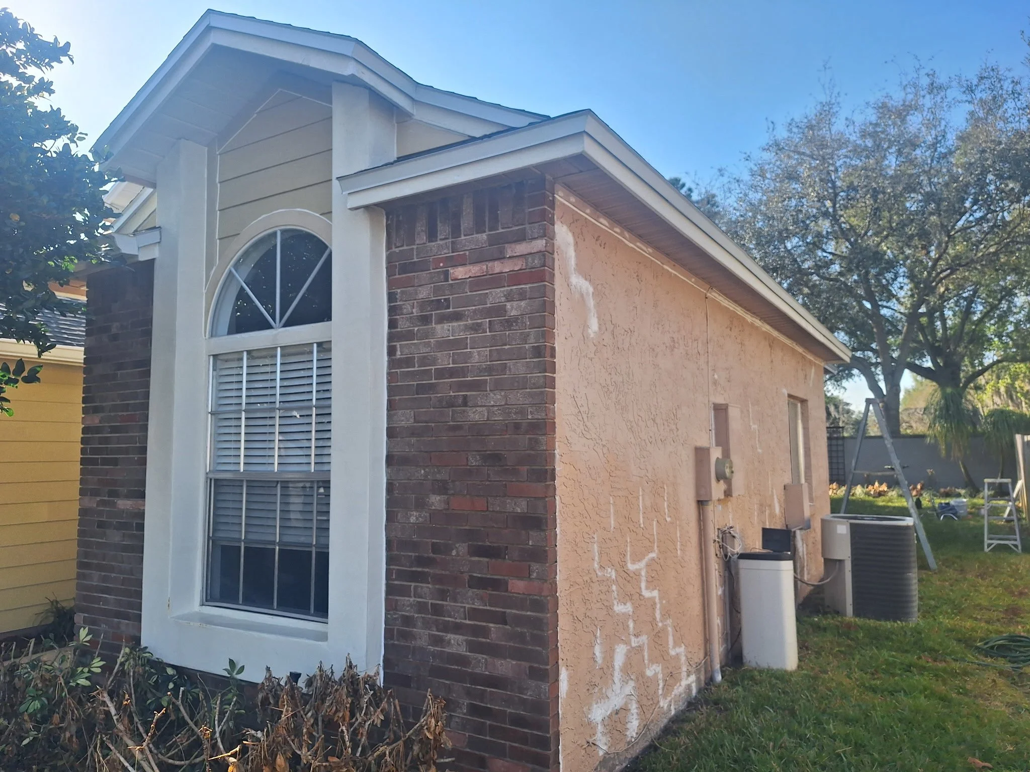 FRONT SIDE STUCCO REPAIR (Before)