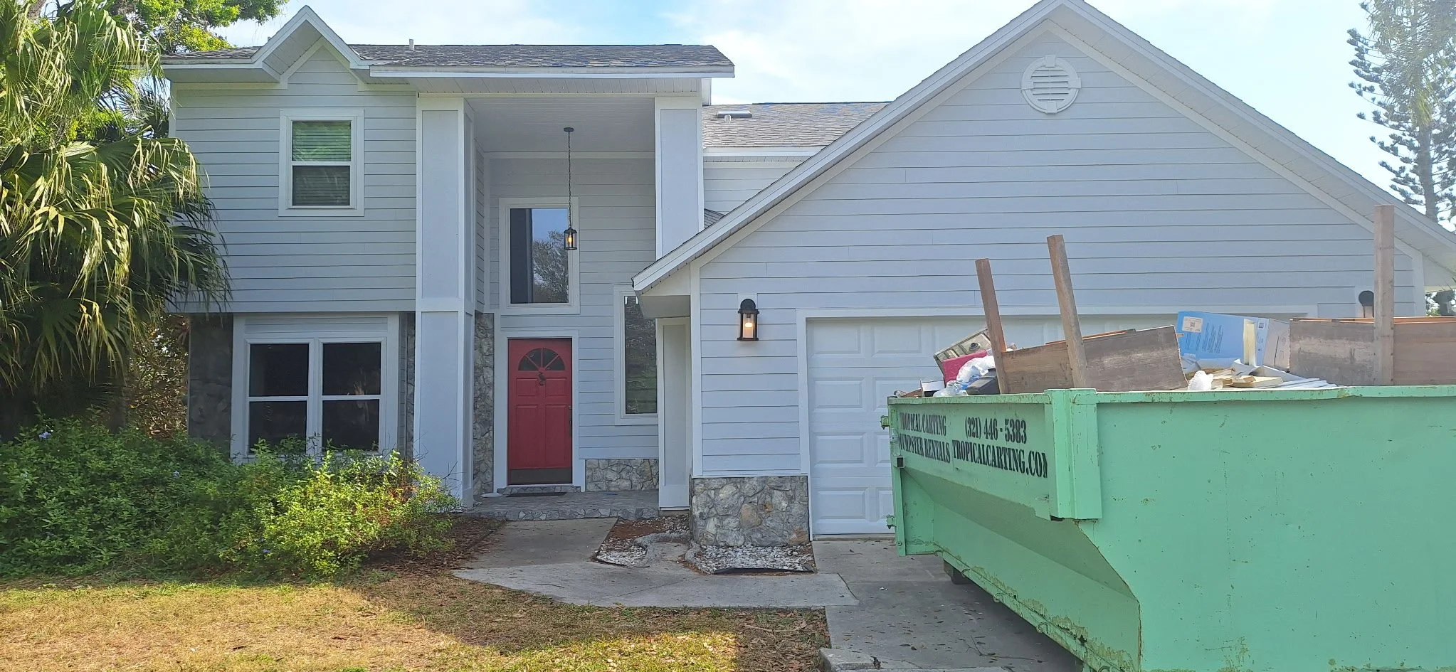 Wide Front with Dumpster (Before/Process Feel)