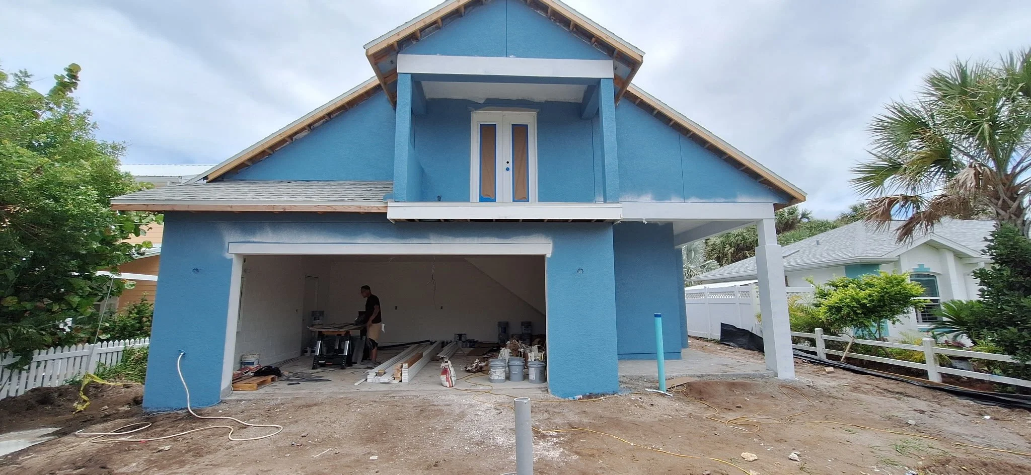 New construction home garage exterior before final painting New Smyrna Beach