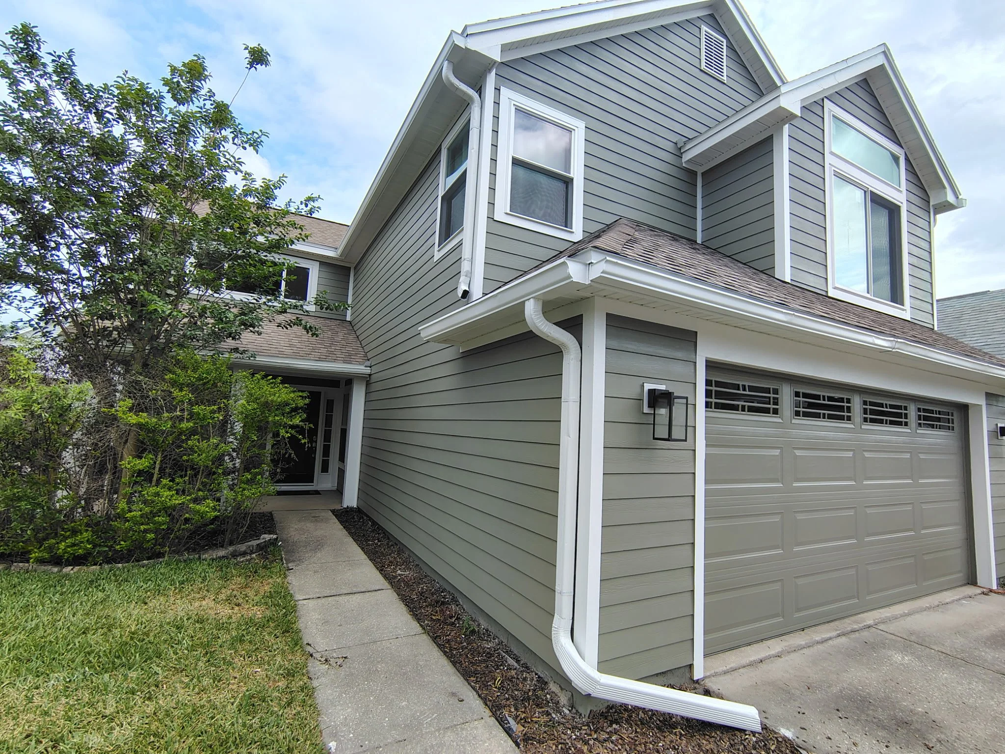 Front Angle – Garage + Walkway