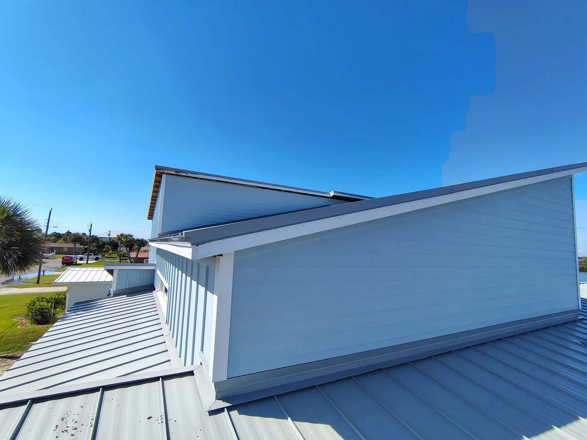 Port Orange New Build Upper Roofline Blue Siding