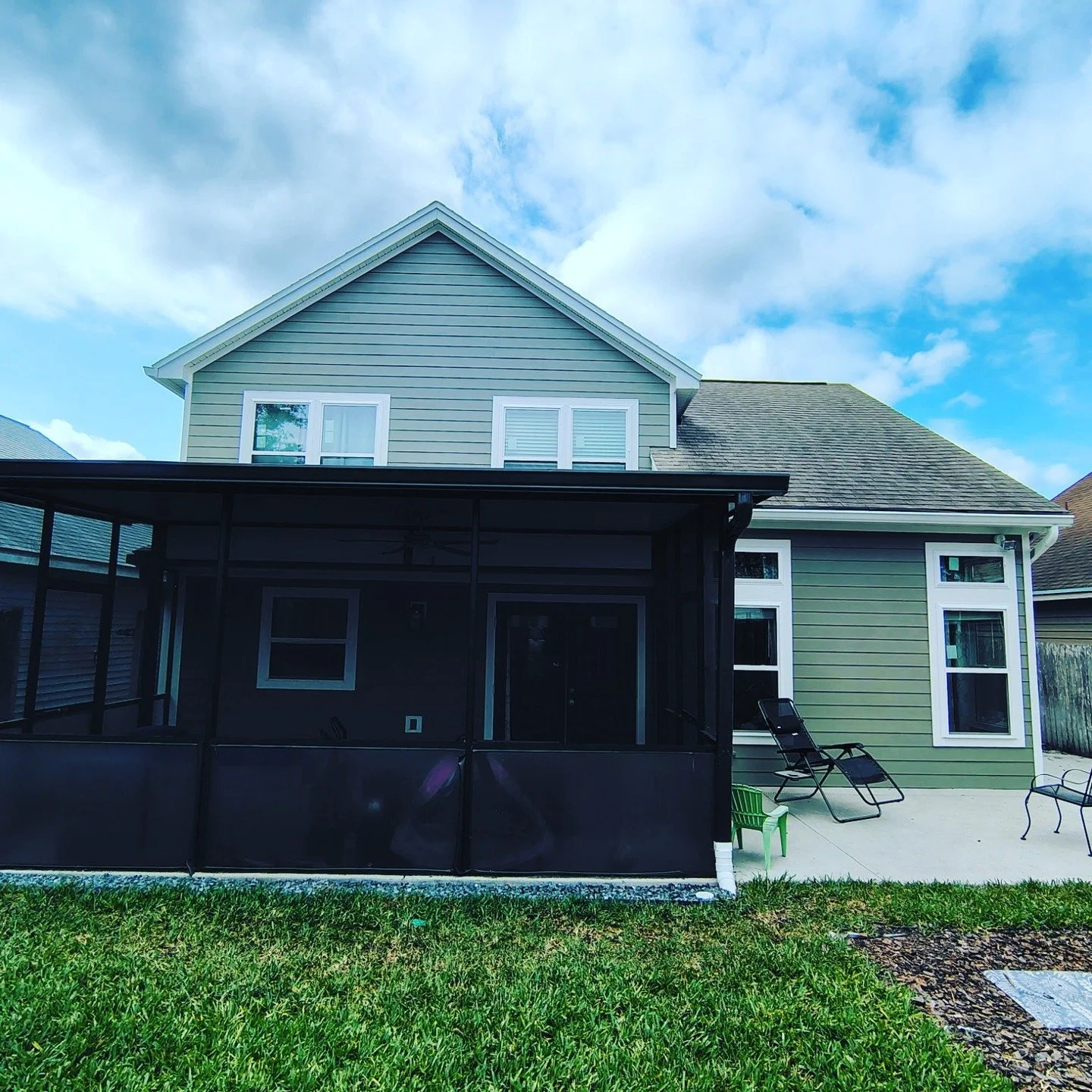 This one came out clean.

We took this Longwood home and gave it a full exterior refresh with a modern sage green and bright white trim&mdash;and you can see how everything just sharpens up instantly.

This is one of those color combos that works per