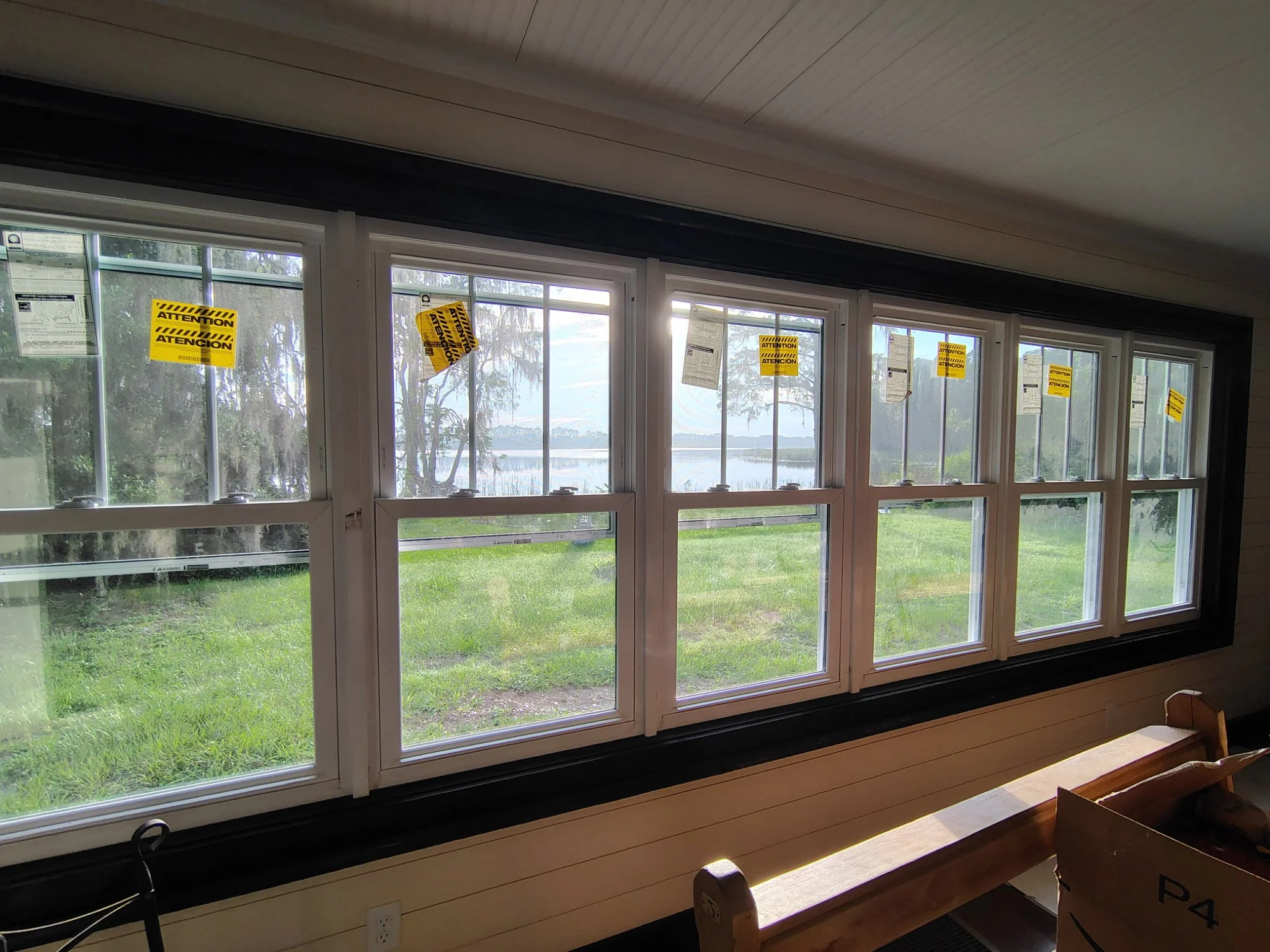 Completed Dark Stained Window Trim with Lake View