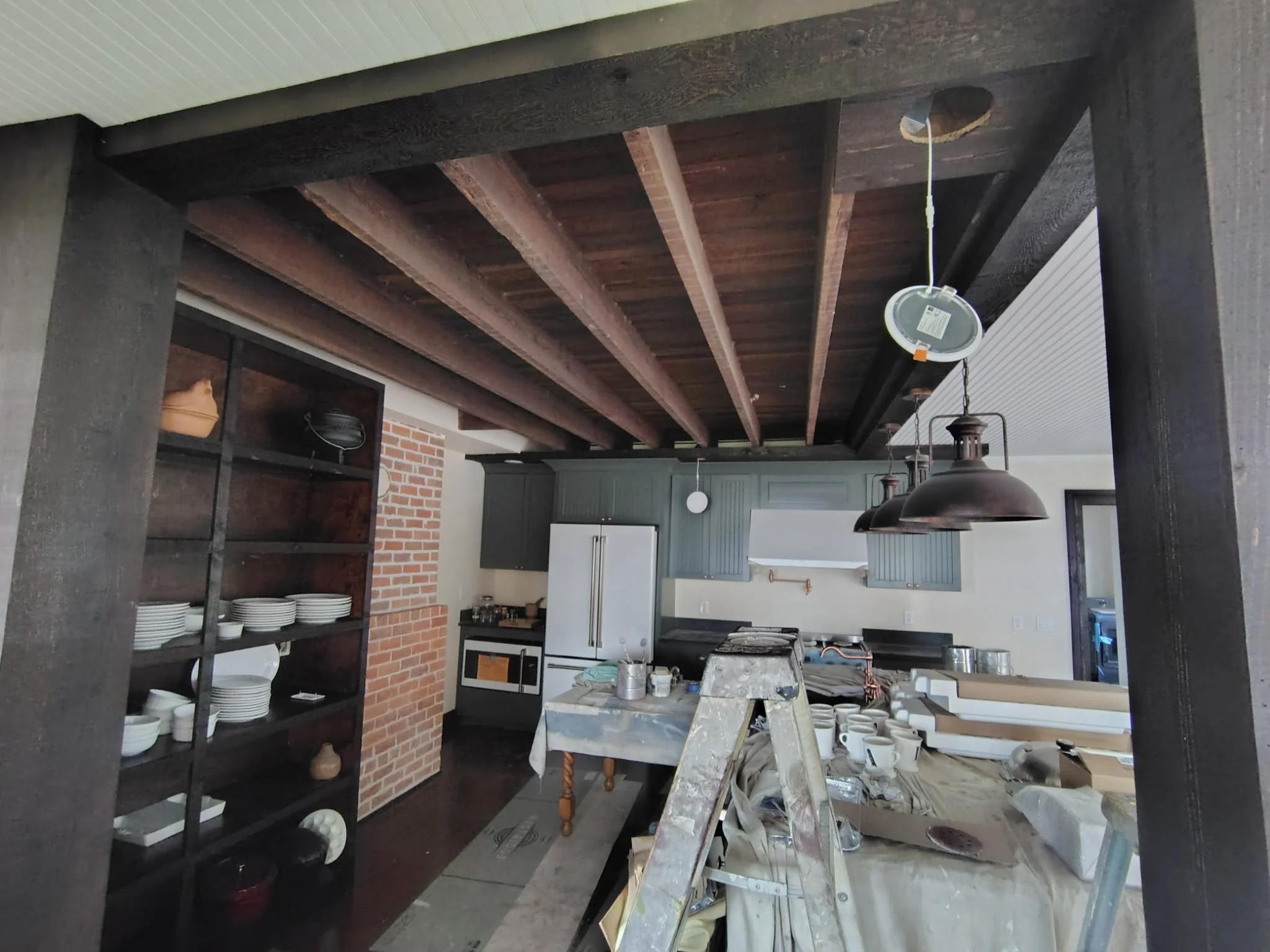 Completed Kitchen View with Stained Beams, Cabinets &amp; Built-Ins