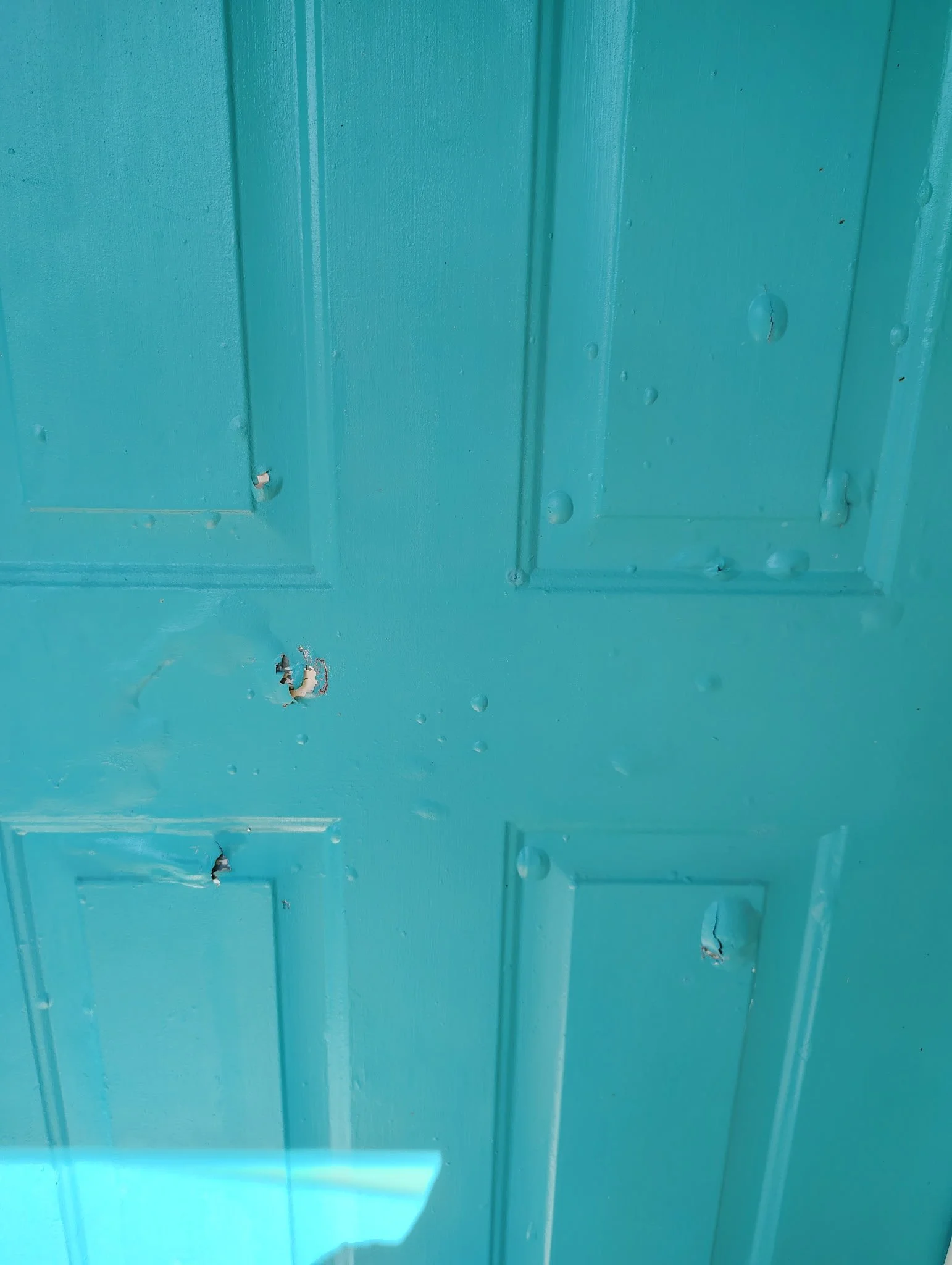BEFORE — DAMAGED TURQUOISE DOOR CLOSE-UP